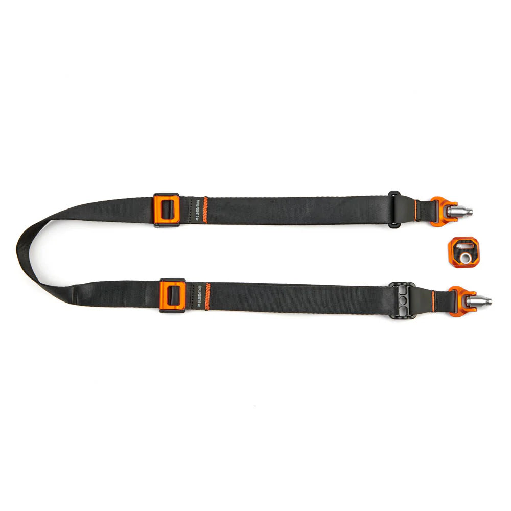 Black camera strap with orange buckles on a white background