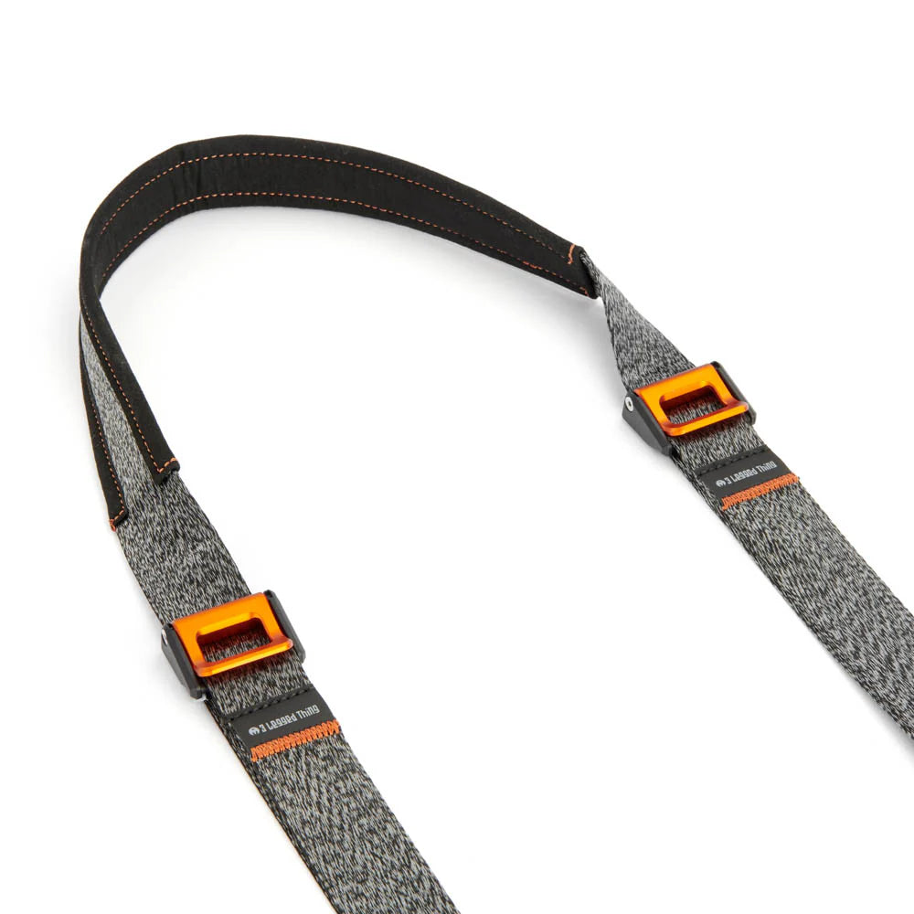 Gray strap with orange buckles on a white background