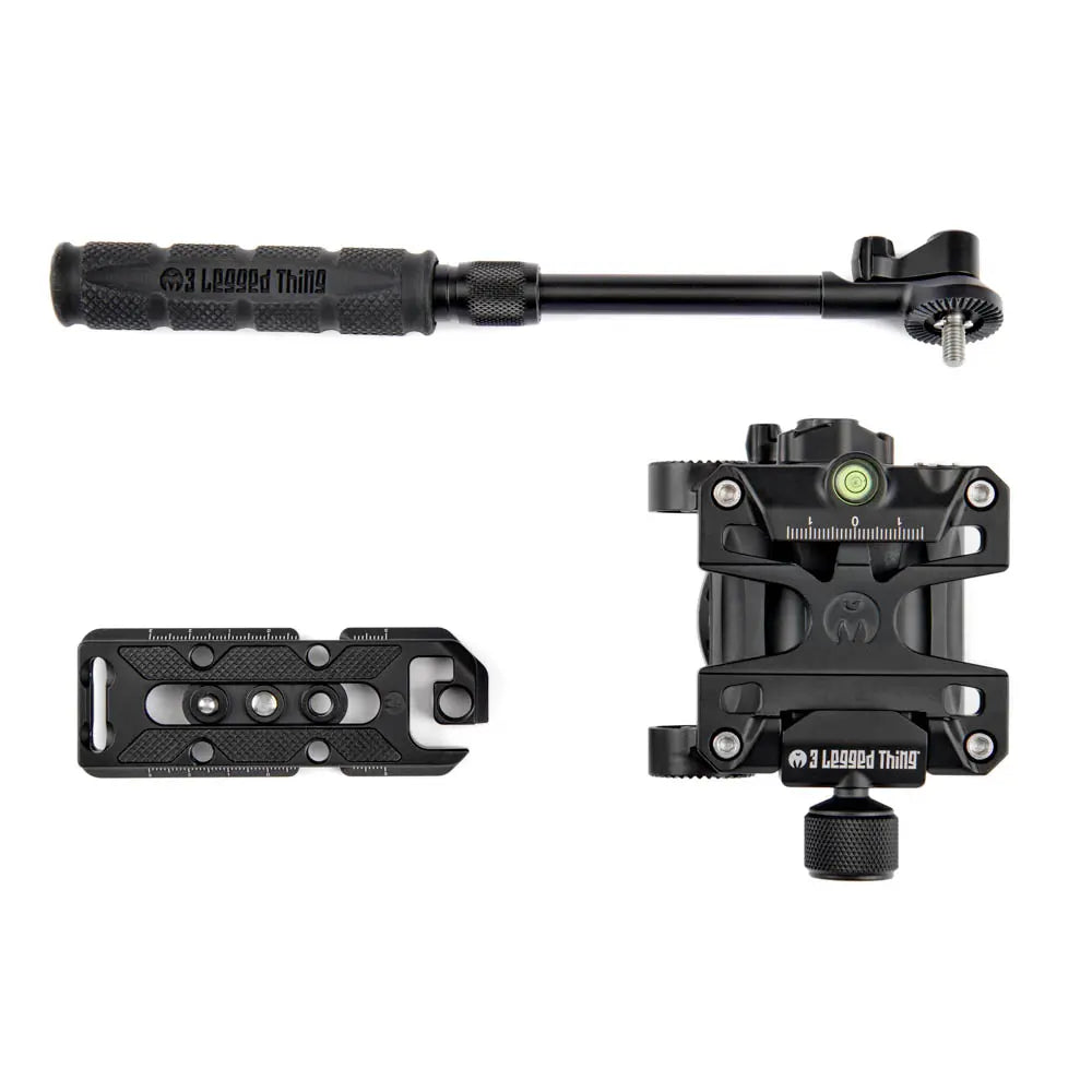 Camera accessories including a monopod and head on a white background