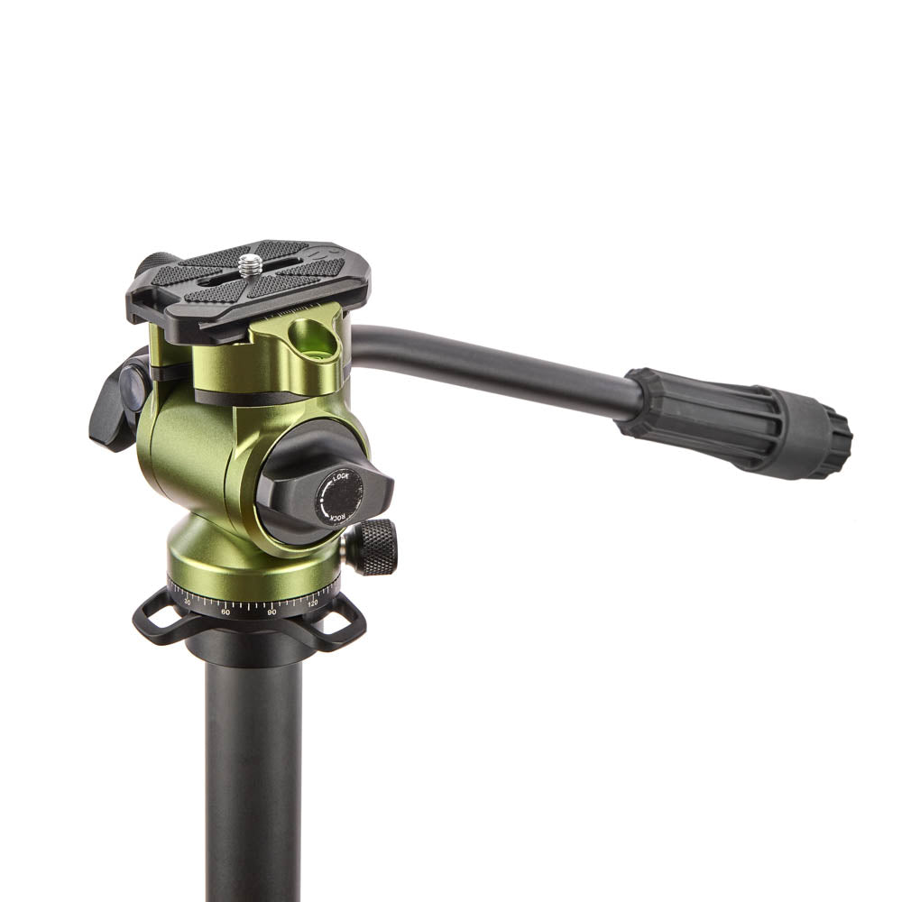 Green and black camera tripod head on a white background