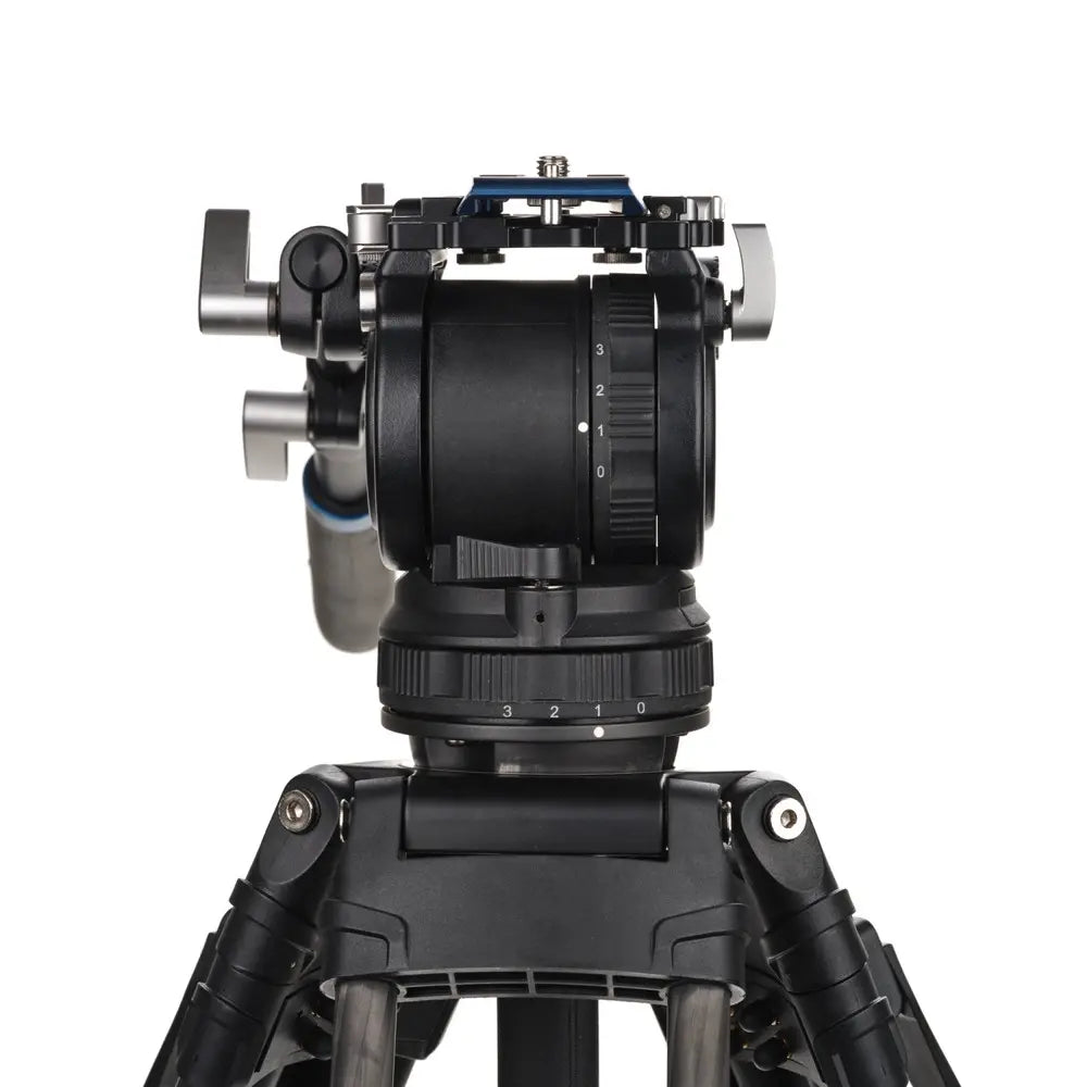 Camera lens on a tripod with a white background