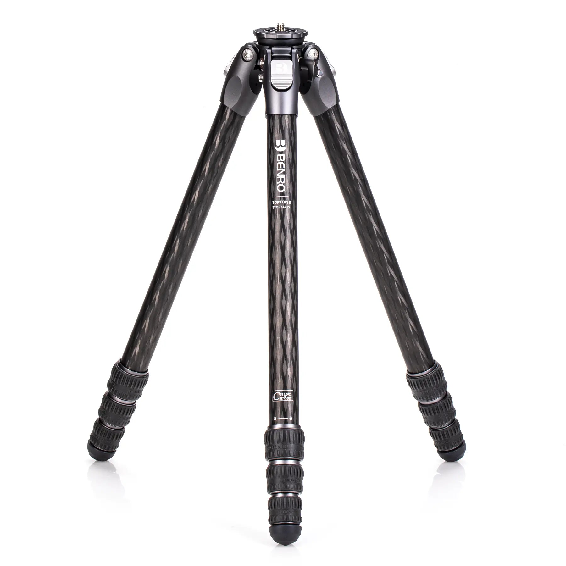 A black carbon fiber tripod with an S4PRO video head, featuring rubber feet and twist locks.