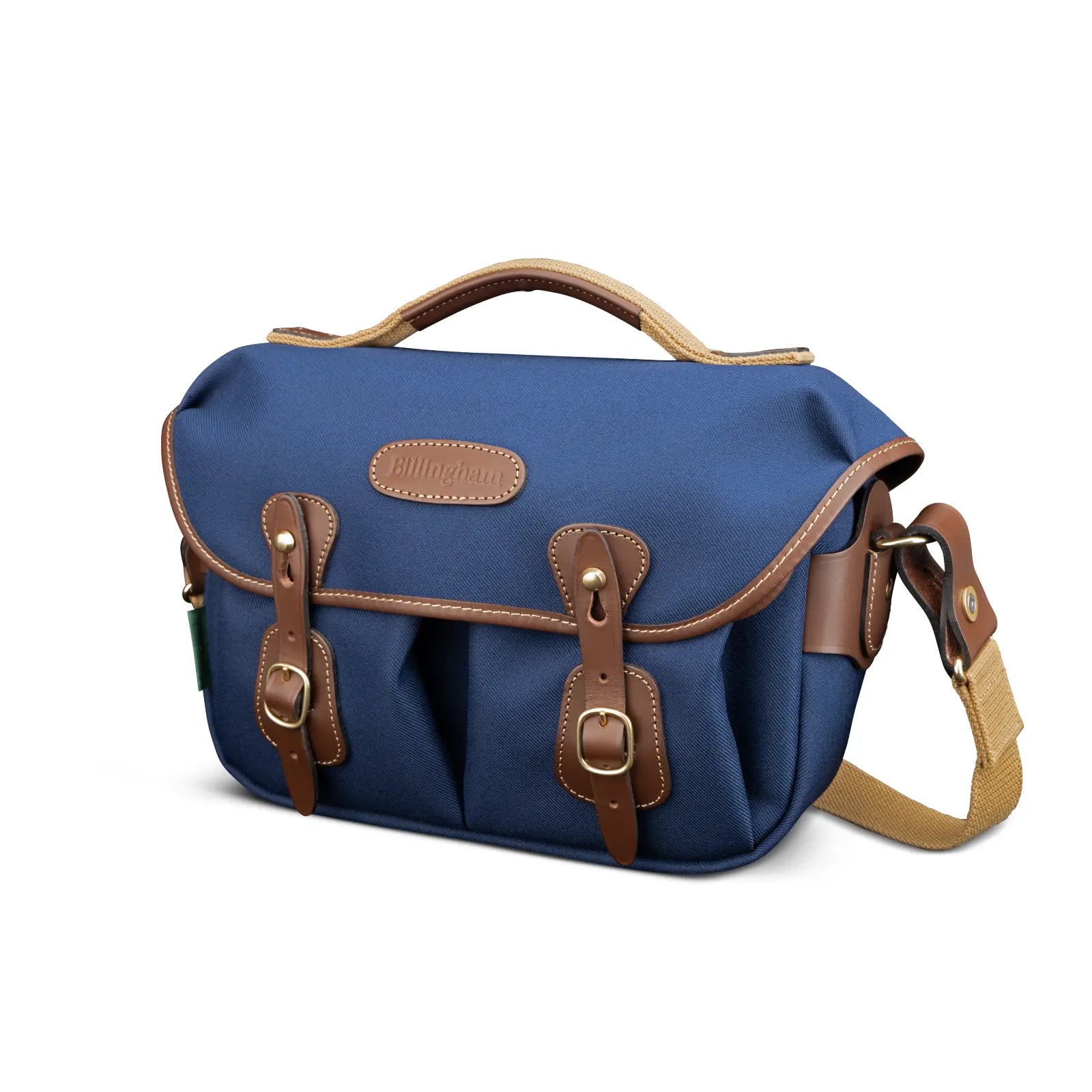 Blue bag with brown leather straps and accents on a white background