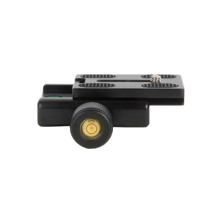 Black camera lens with a yellow center on a white background