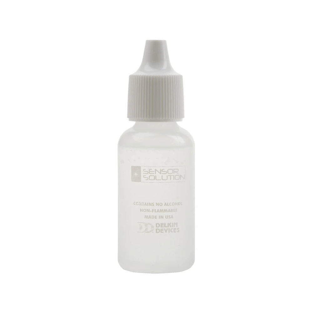 White bottle with a cap on a white background