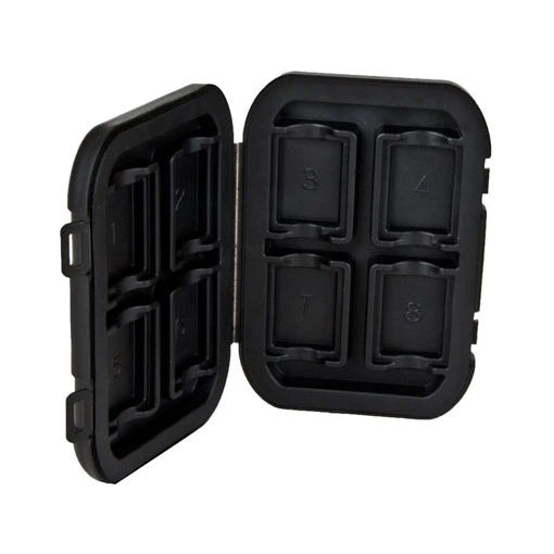 Black silicone ice cube tray with compartments on a white background