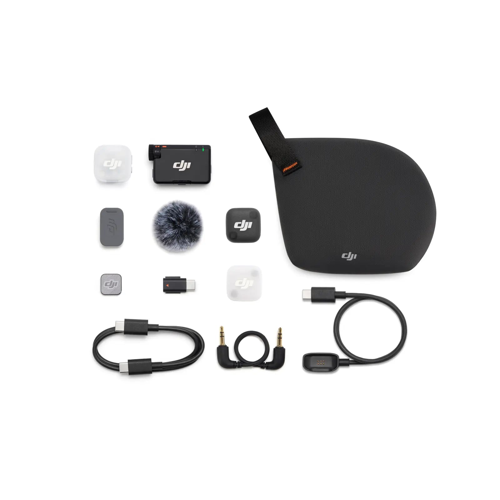 Collection of DJI accessories including a case, microphone, and cables on a white background