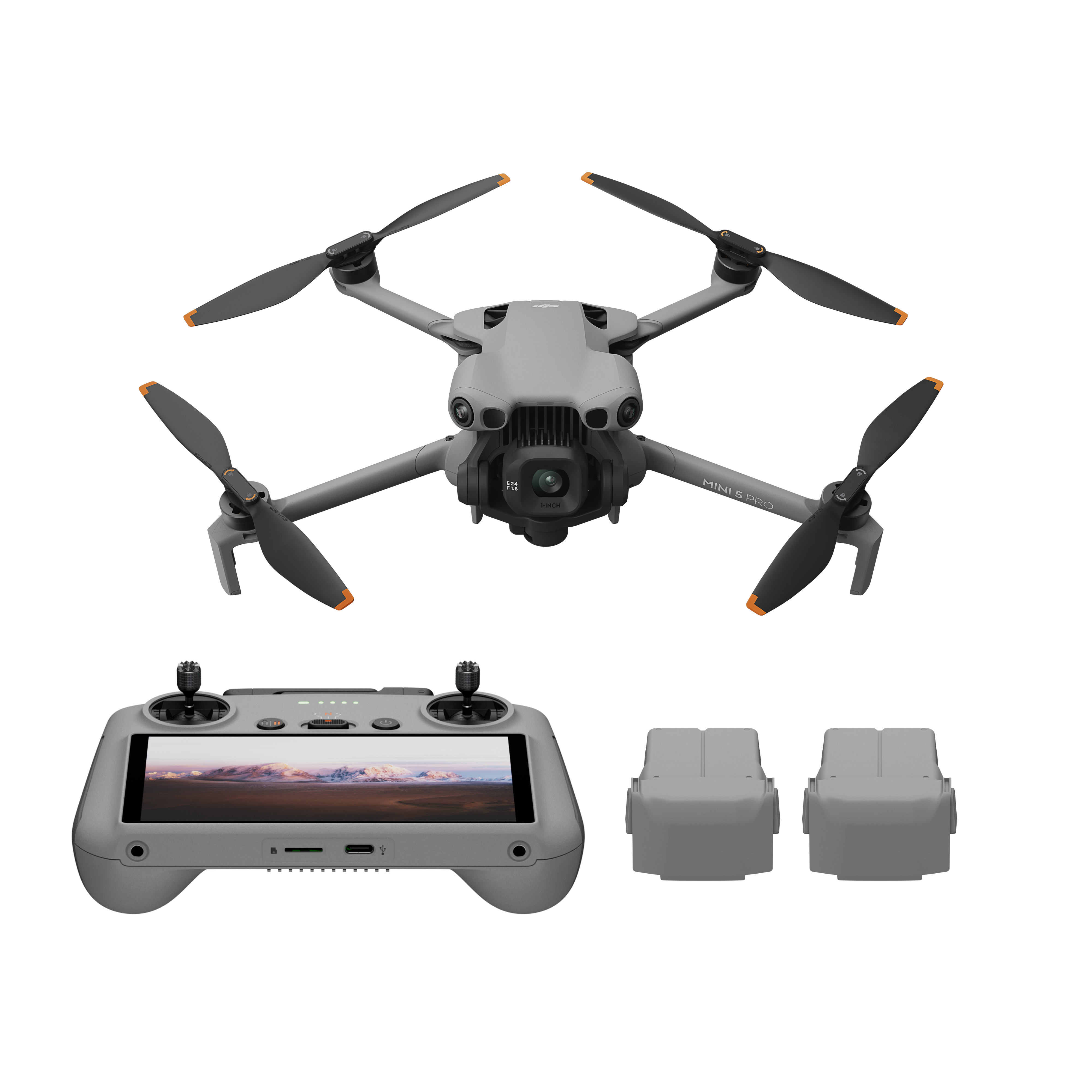 Drone with remote control and batteries on a white background