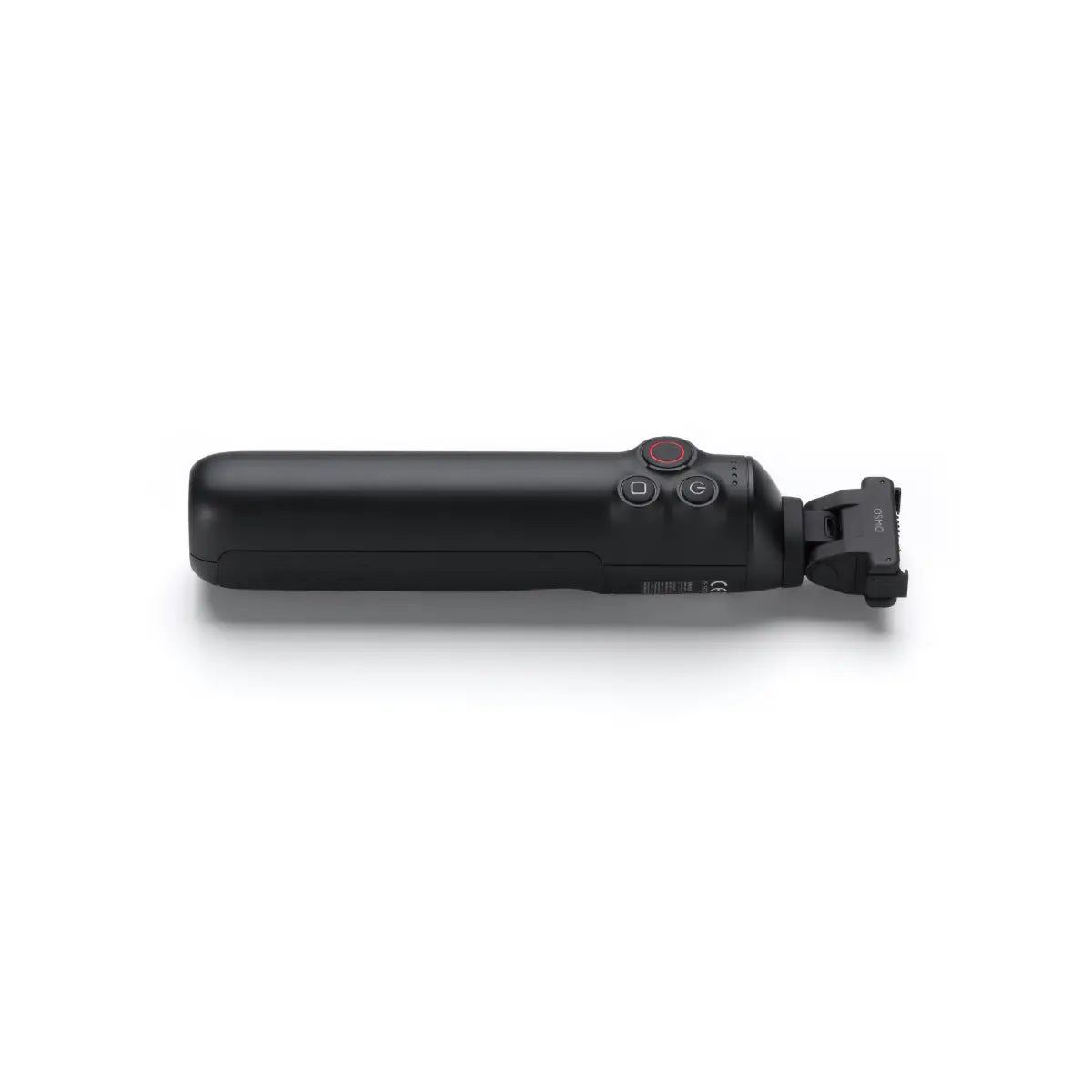 Black grooming tool on a white background
