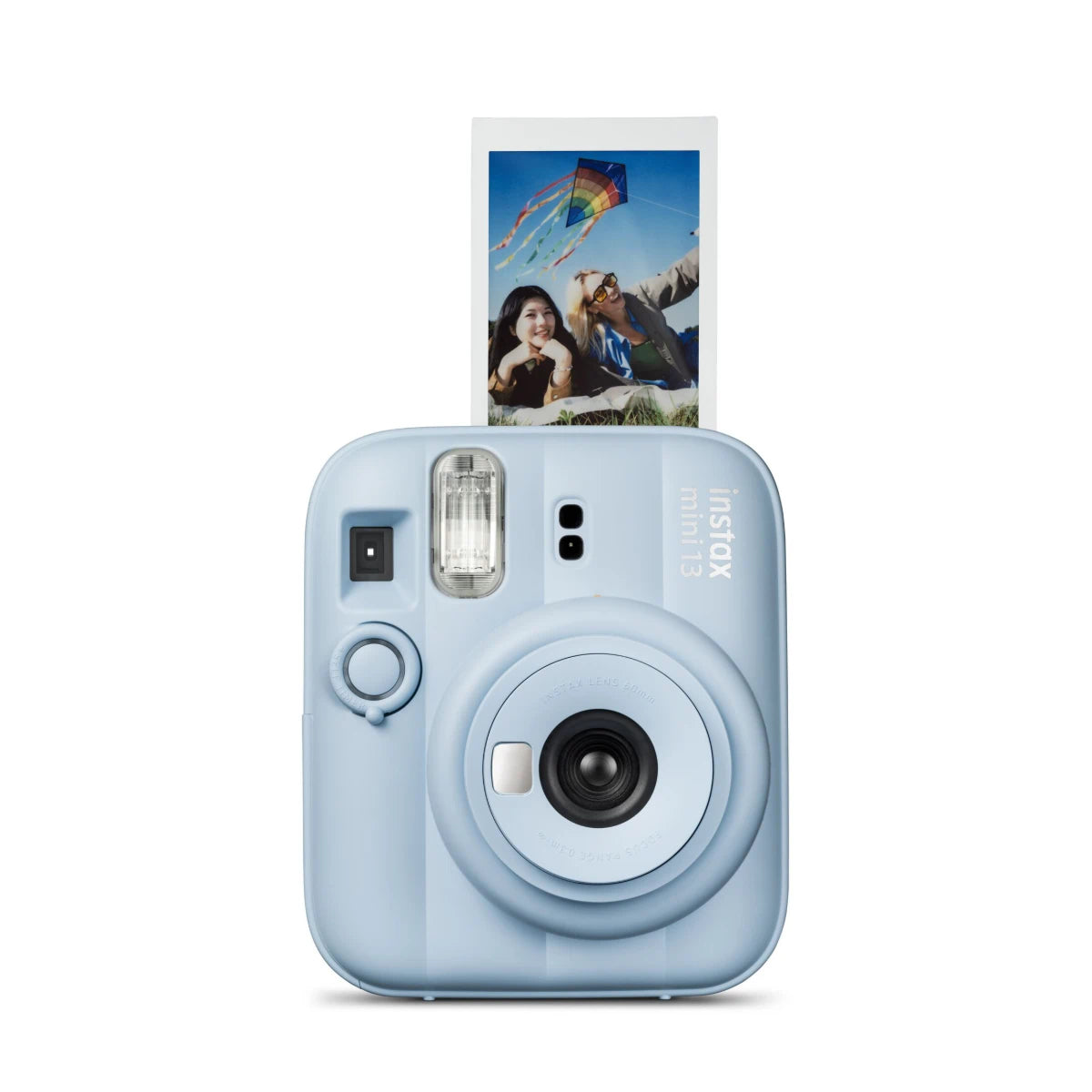 Blue instant camera with a photo of two people and a kite on the display