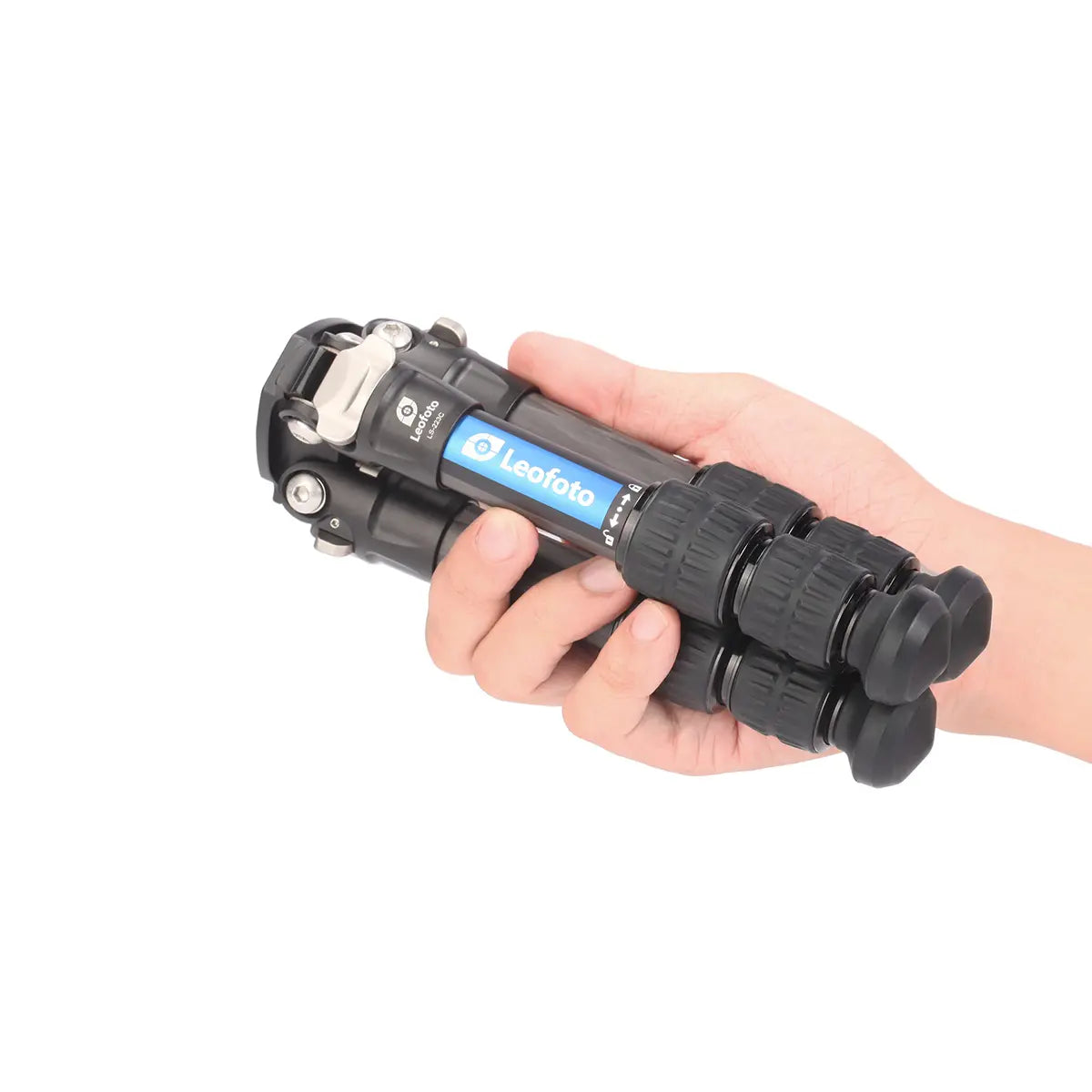 Hand holding a black multi-tool with Leofoto branding on a white background