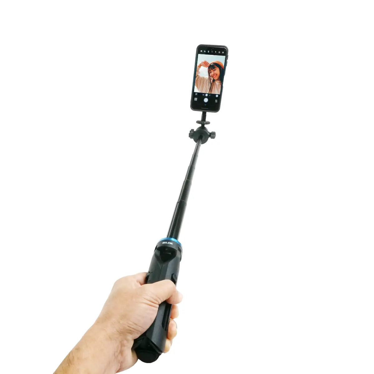 Hand holding a selfie stick with a phone attached on a white background