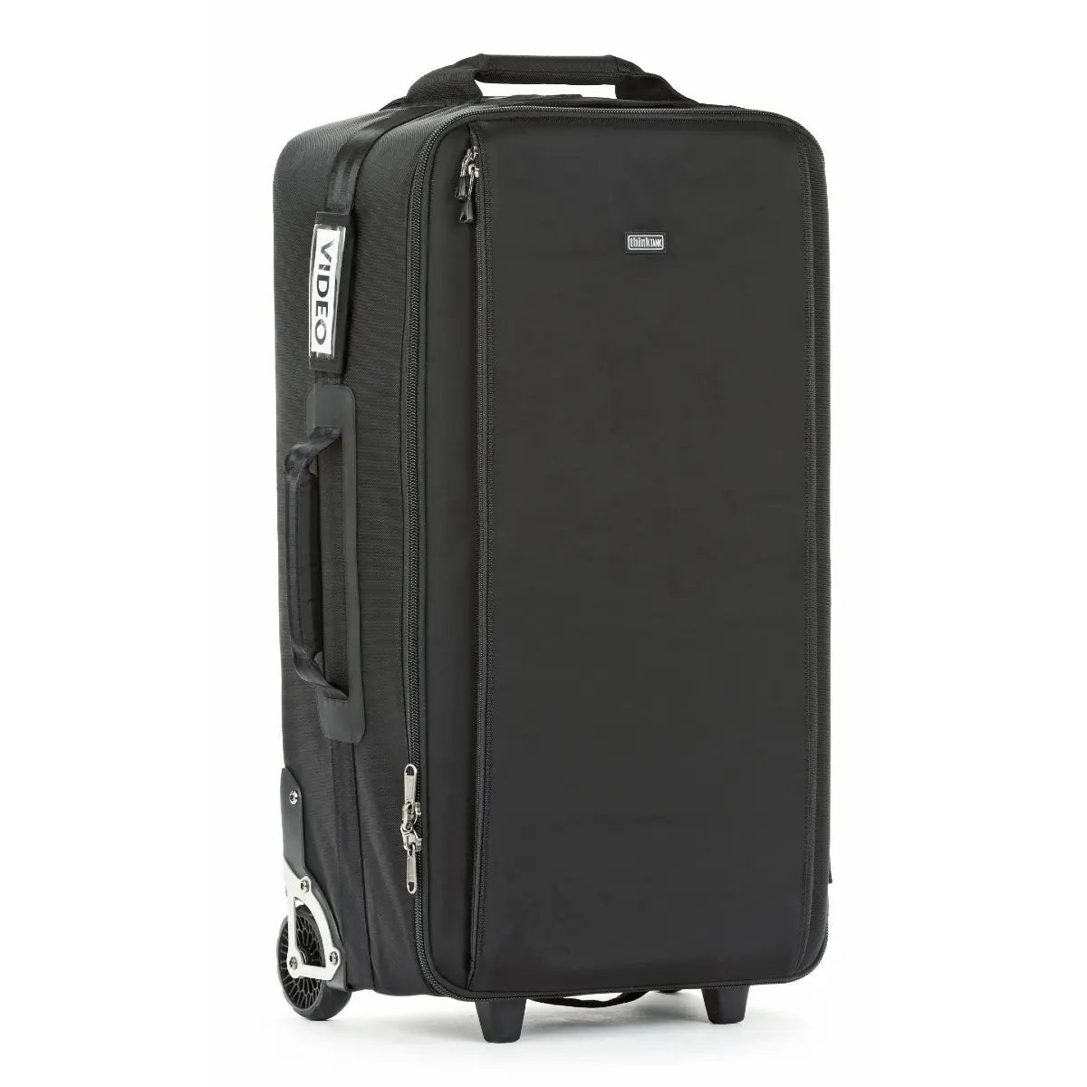 Black suitcase with wheels and handle on a white background