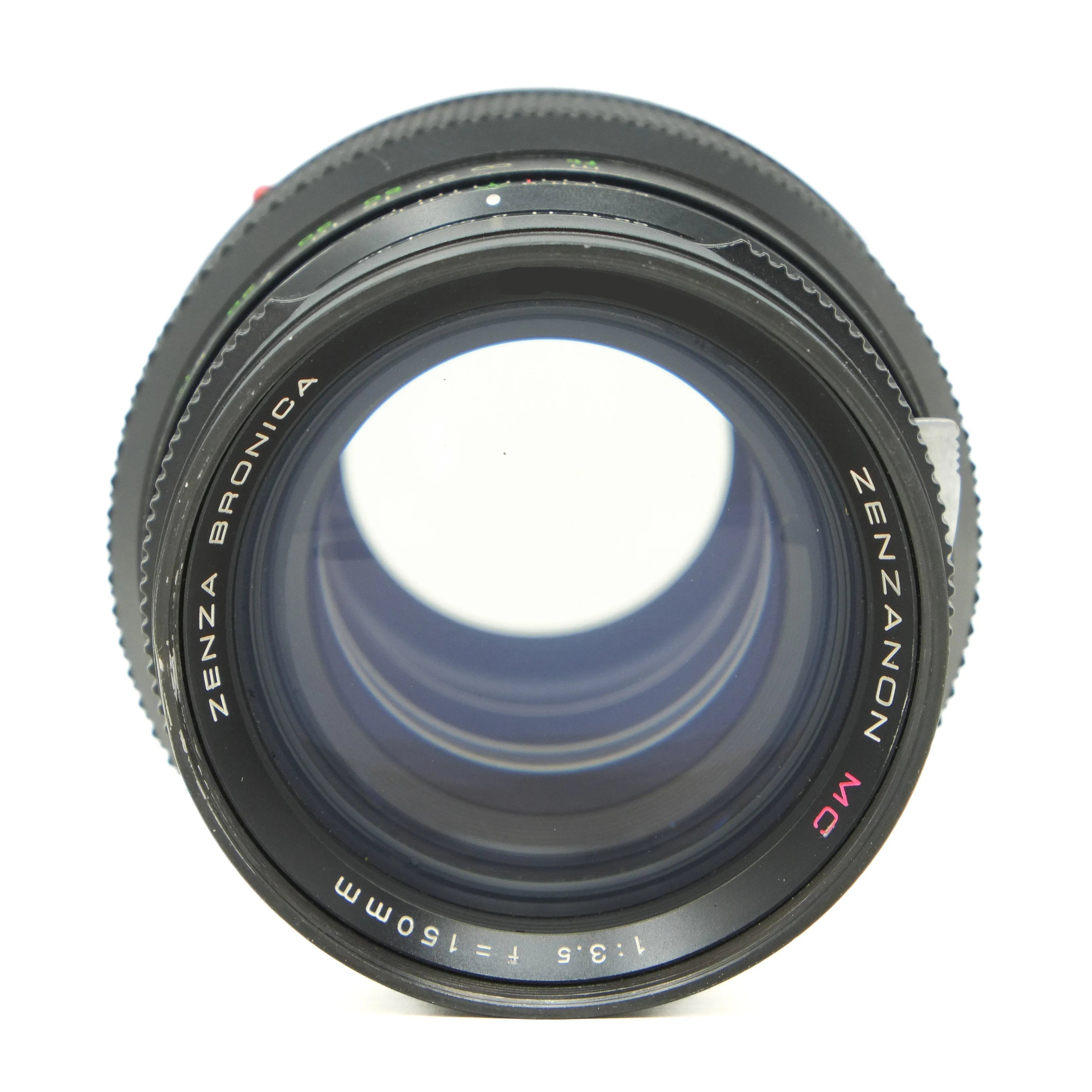 Camera lens with 'Zenza Bronica' branding on a white background
