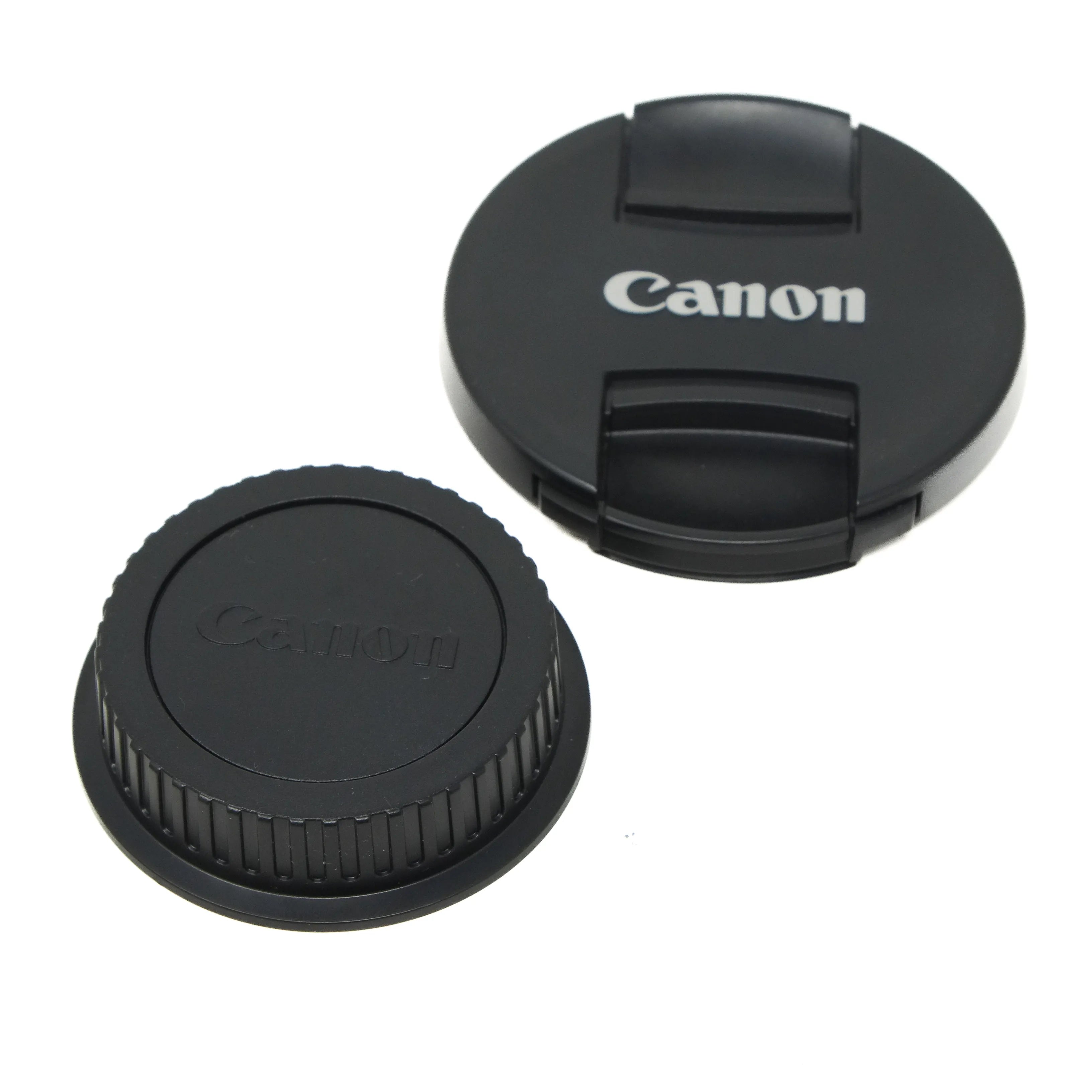 Canon lens cap and rear cap on a white background