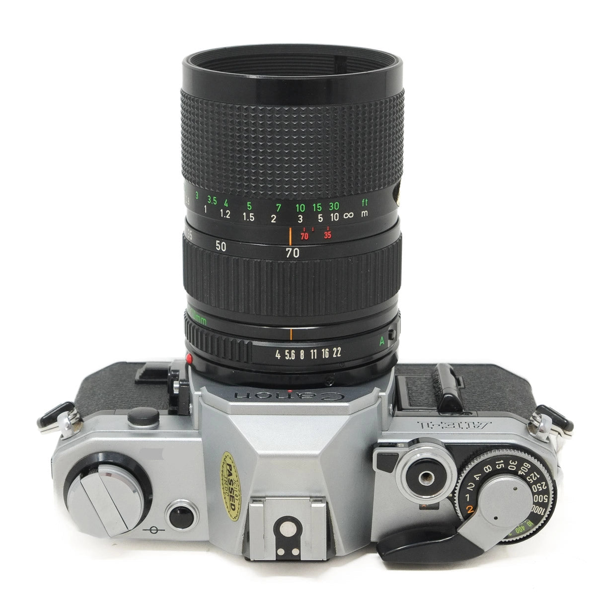 Vintage camera with a large lens on a white background