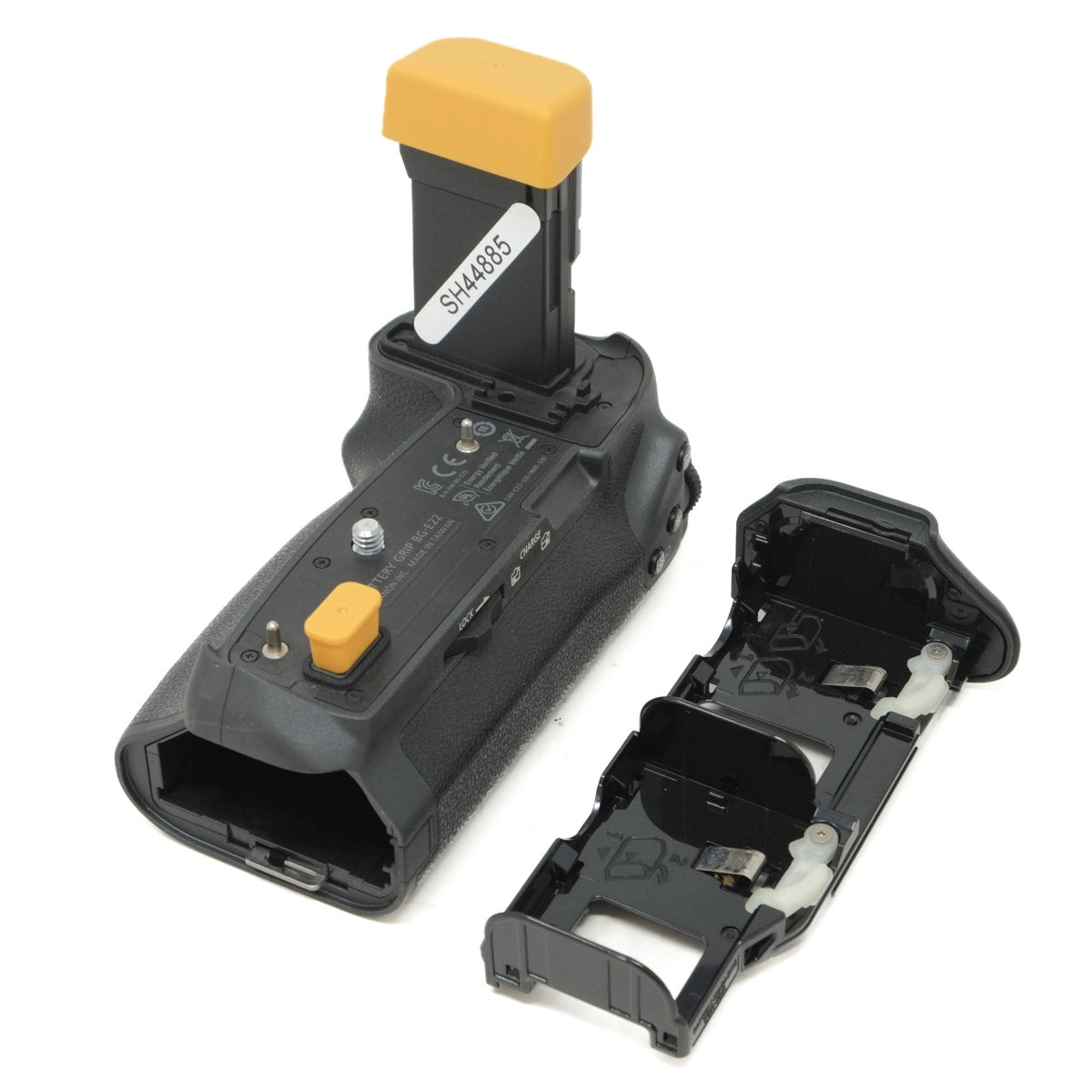 Used Canon BG-E22 battery Grip with PD-E1 charger - top angle with tray