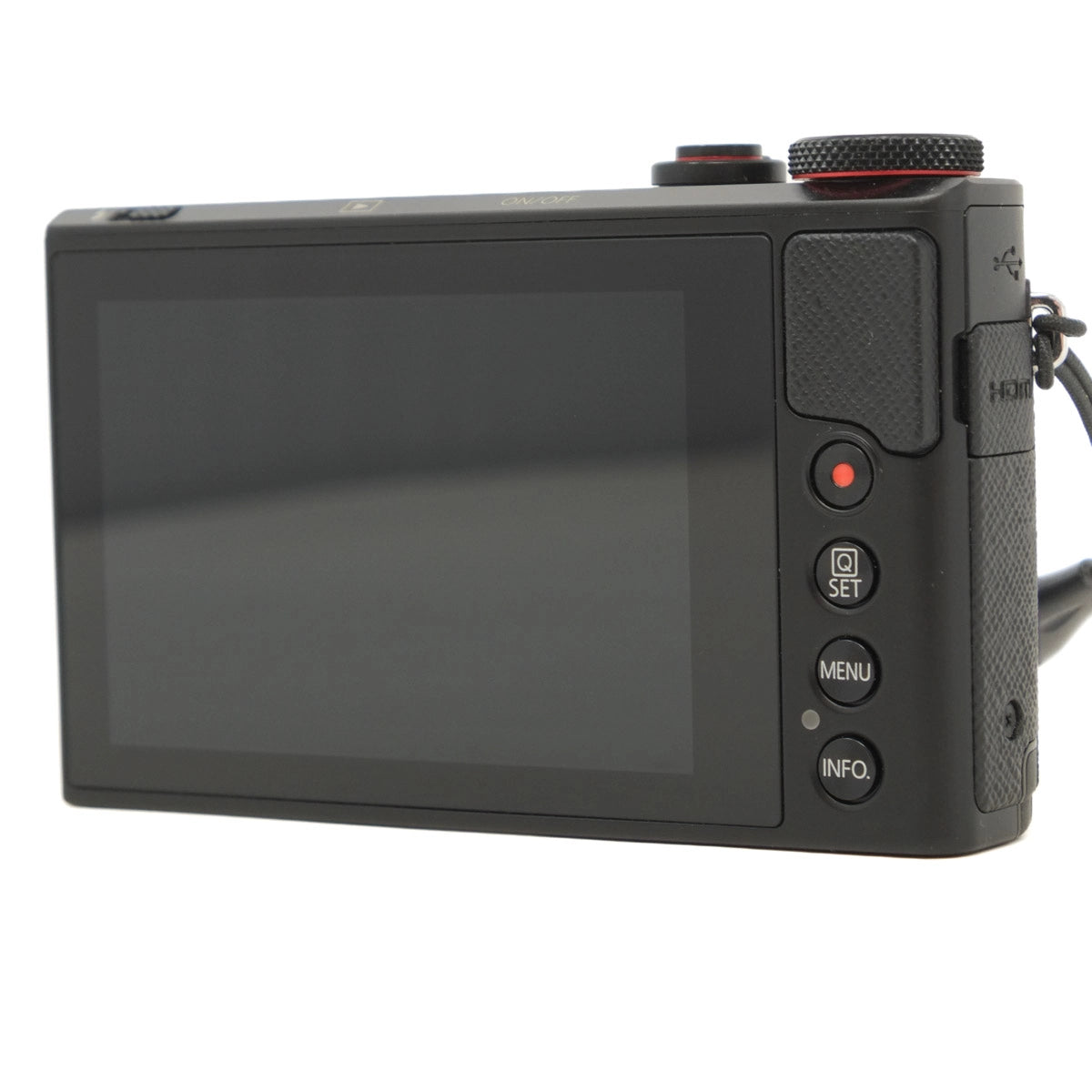 Black digital camera with screen and control buttons on a white background