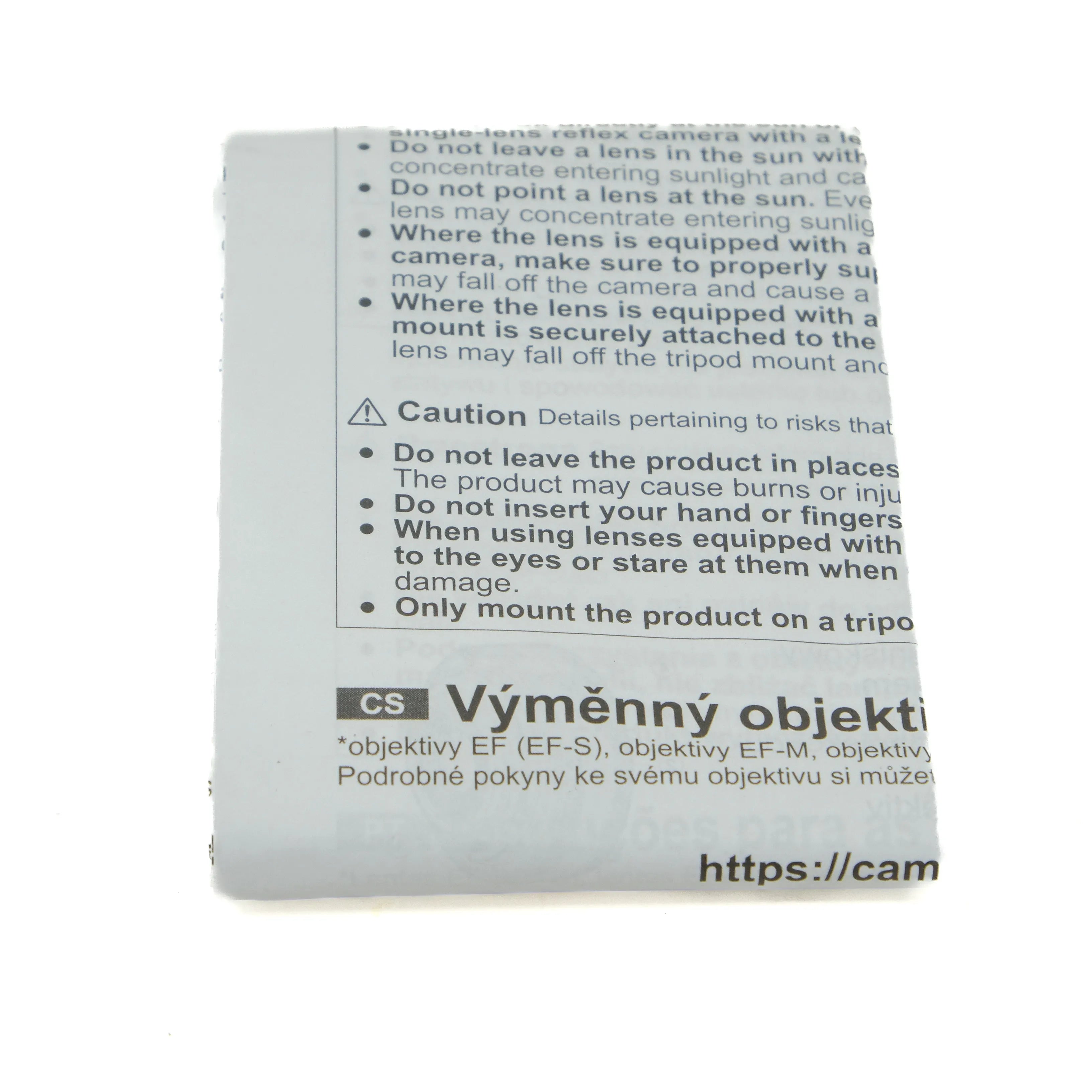 Camera lens manual with text and branding on a white background