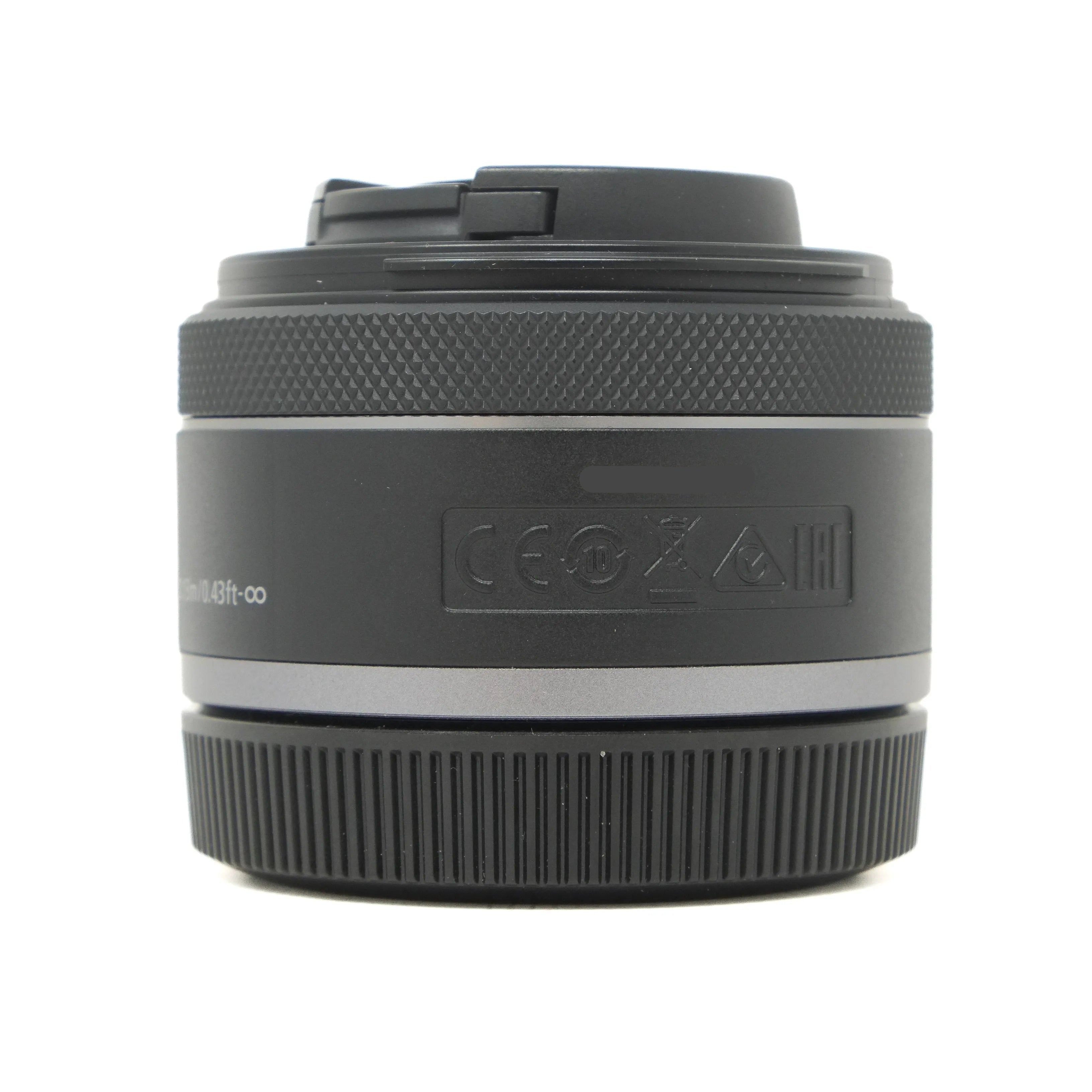 Black camera lens on a white background