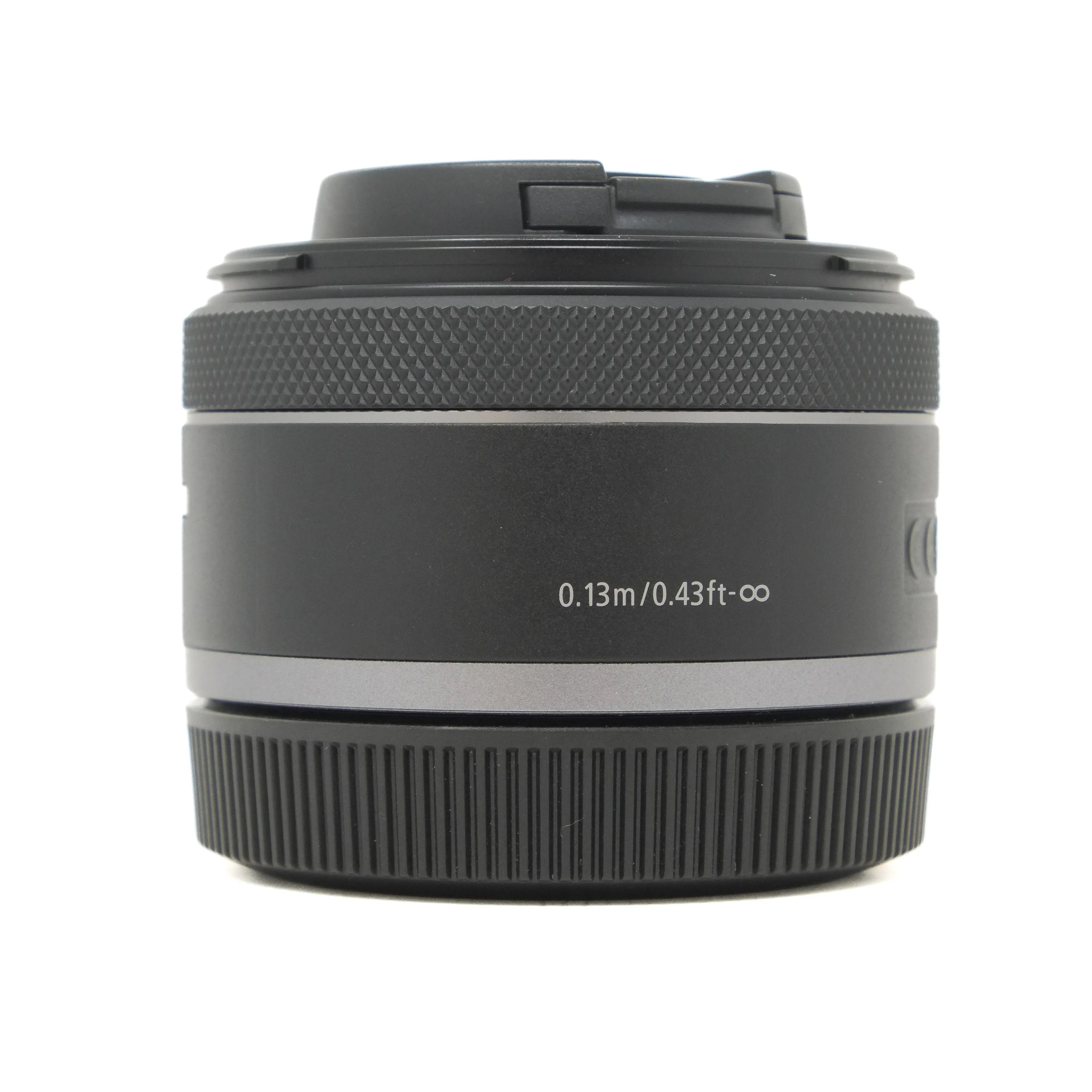 Camera lens with text on a white background