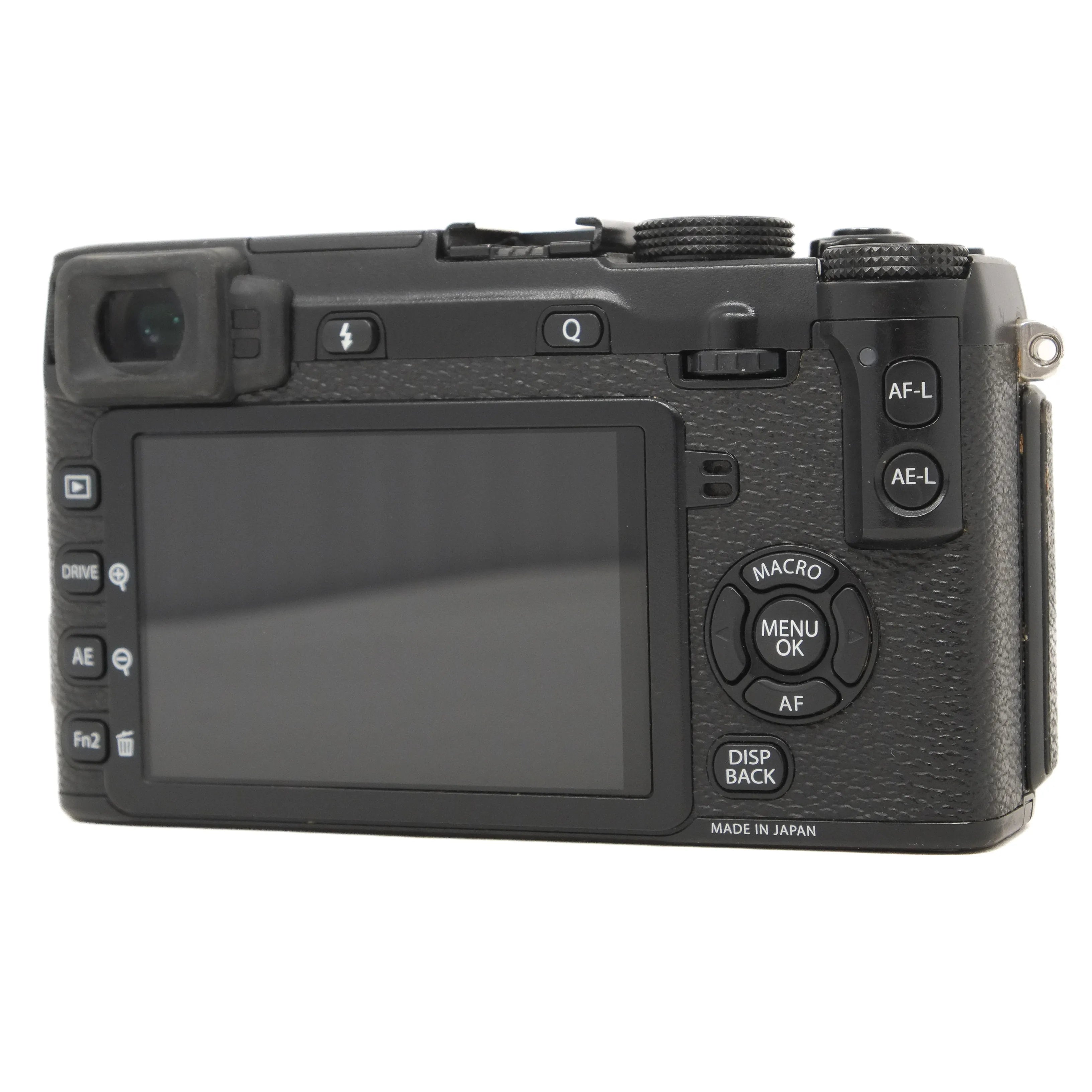 Back view of a black camera with control buttons on a white background