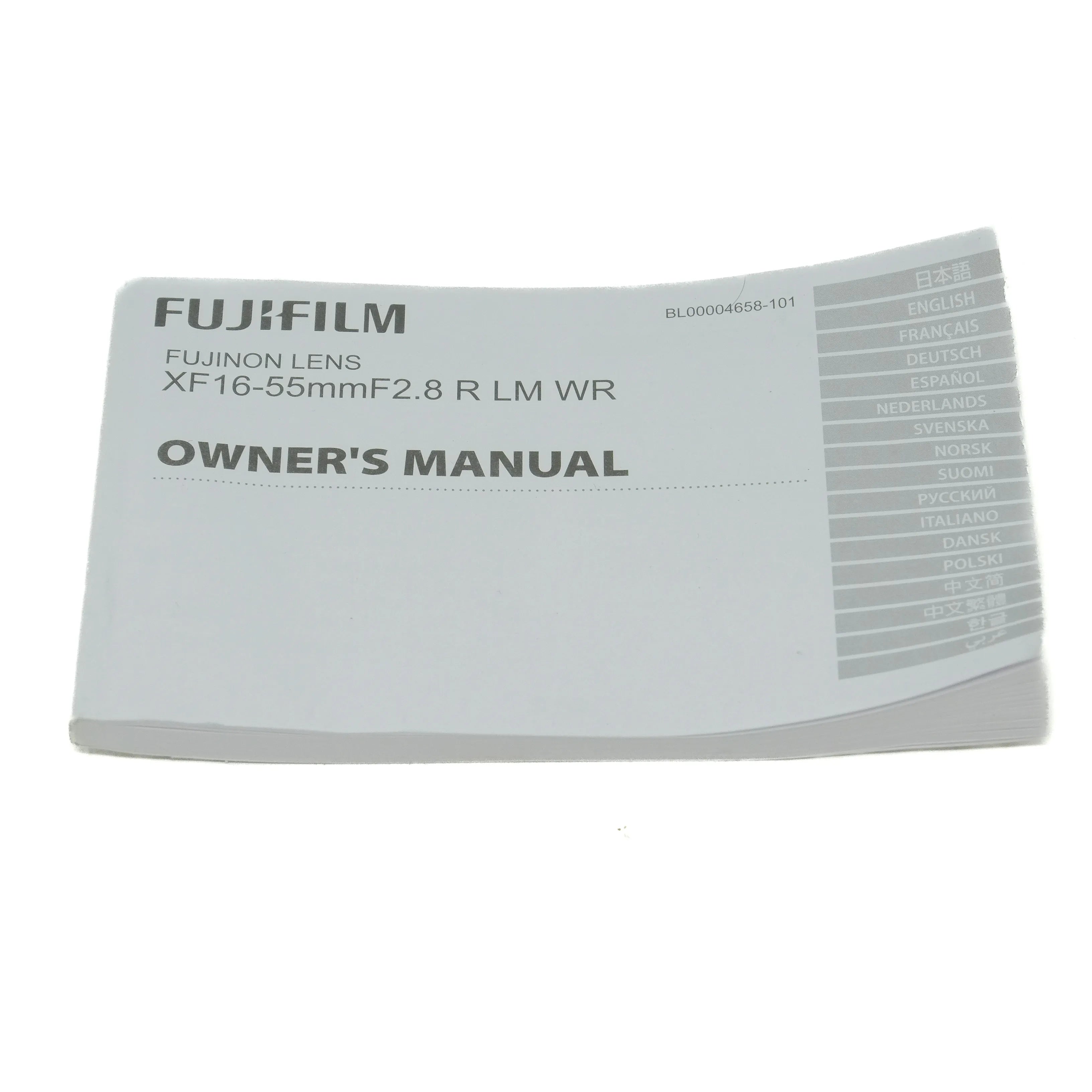 Fujifilm lens owner's manual on a white background