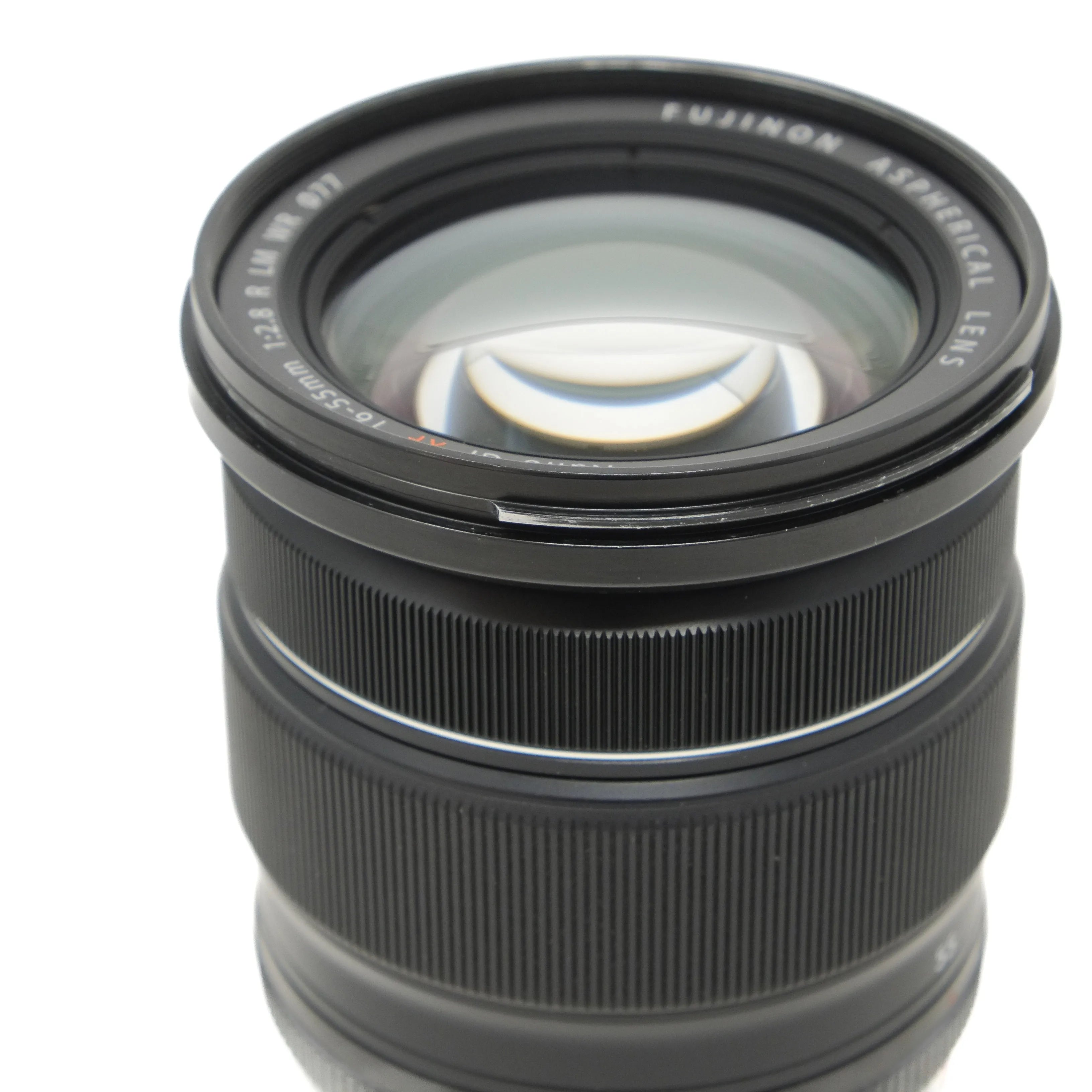 Camera lens with 'FUJINON' branding on a white background