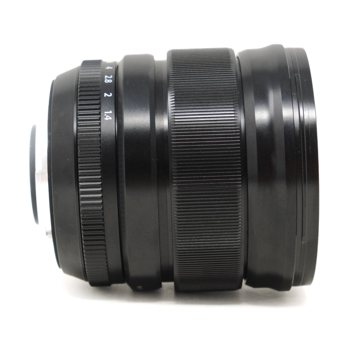 Black camera lens on a white background