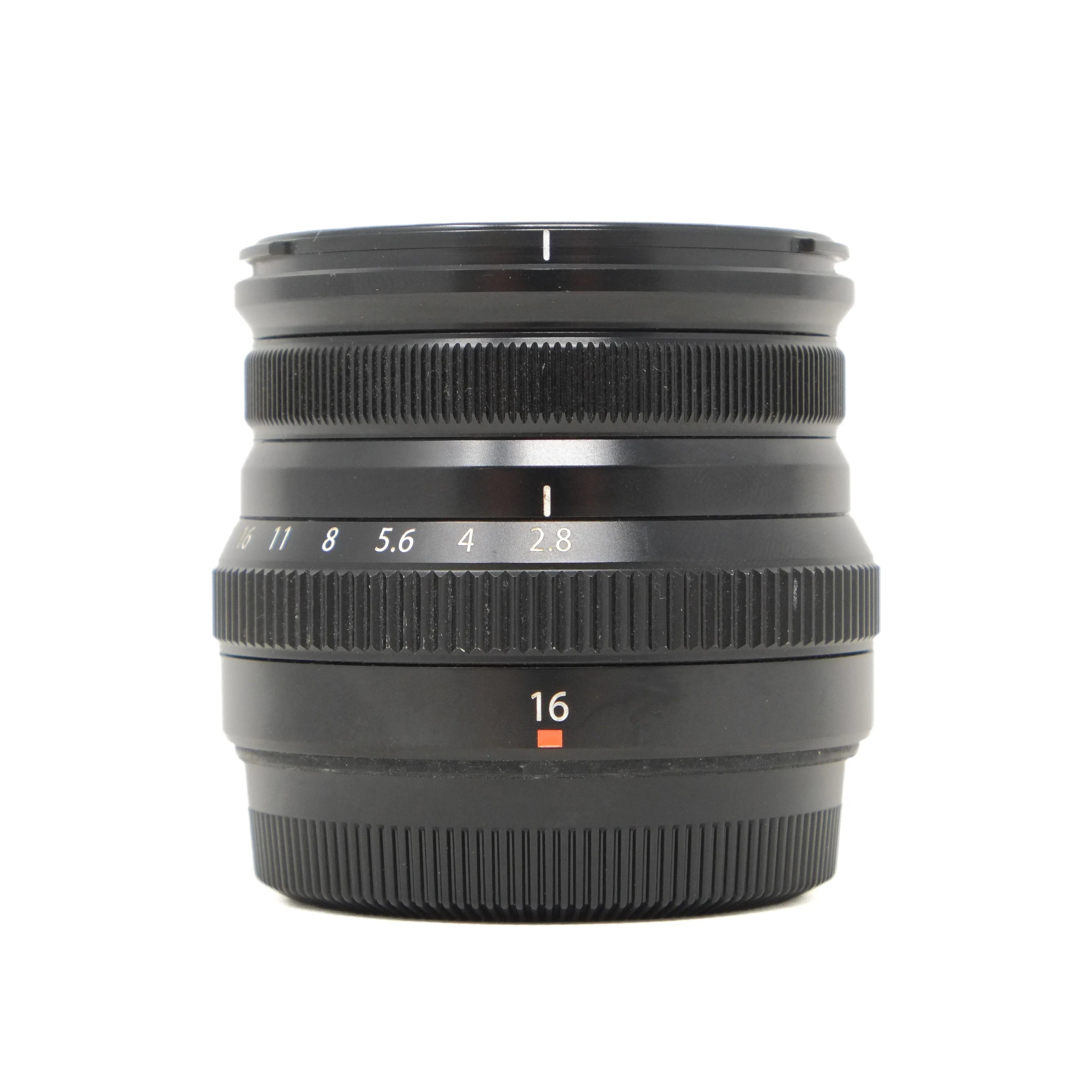 Camera lens with focus and aperture details on a white background
