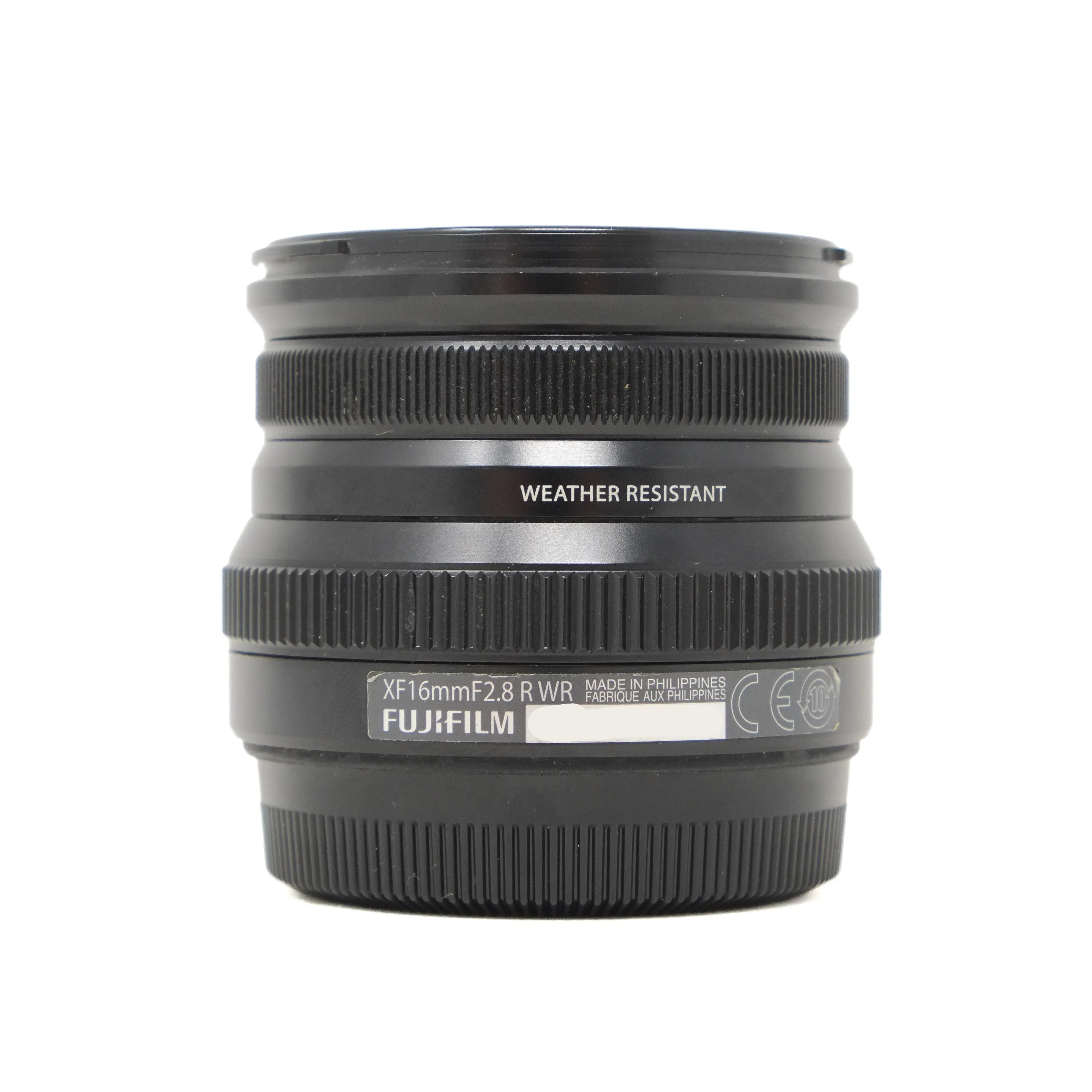 Fujifilm camera lens on a white background