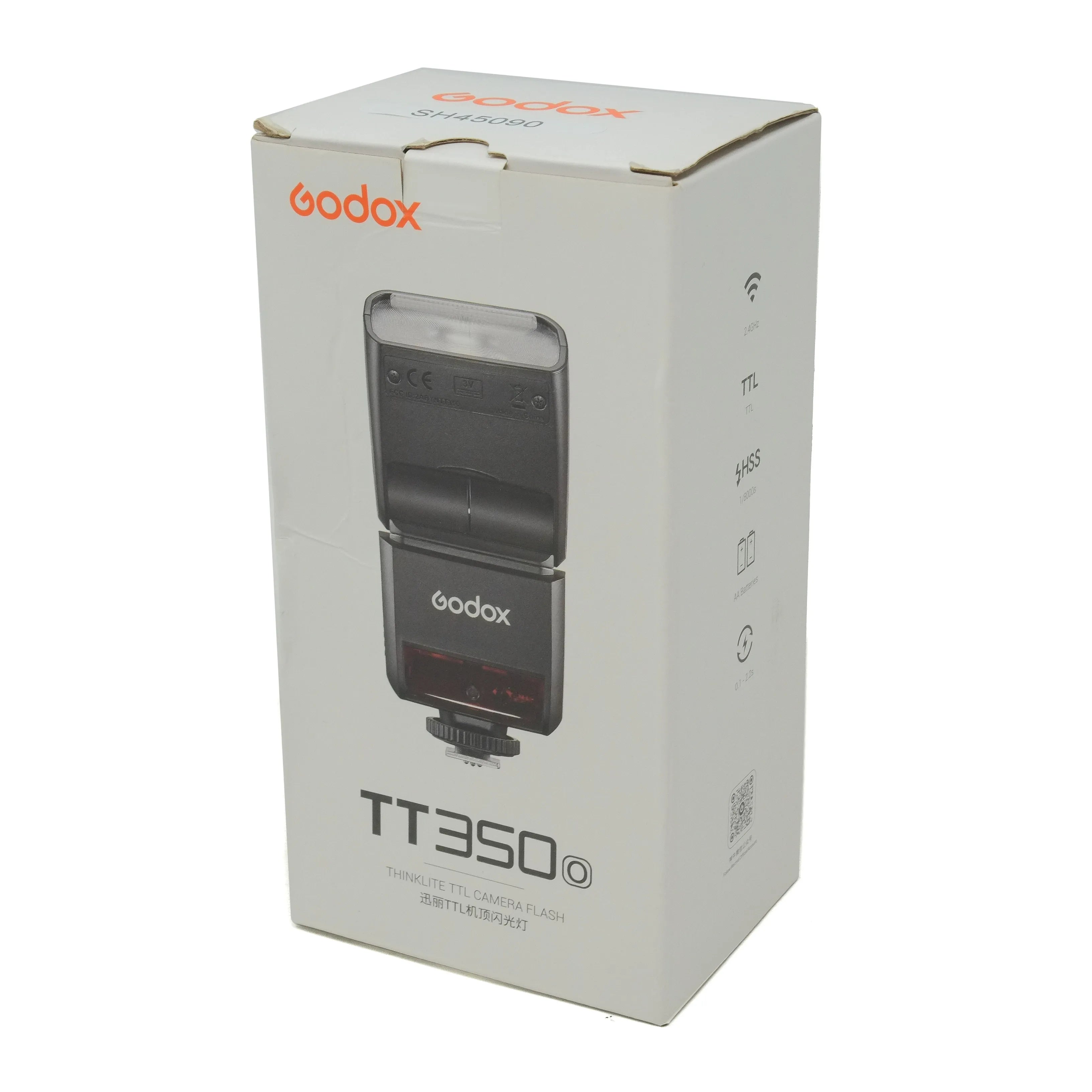 Godox TT350 camera flash in its packaging on a white background