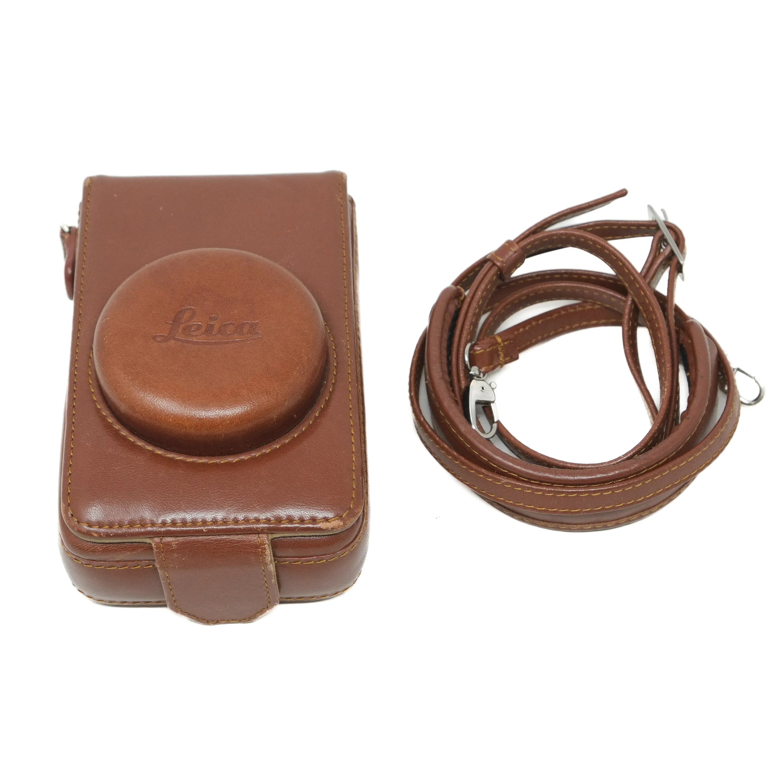 Brown camera case with strap on a white background