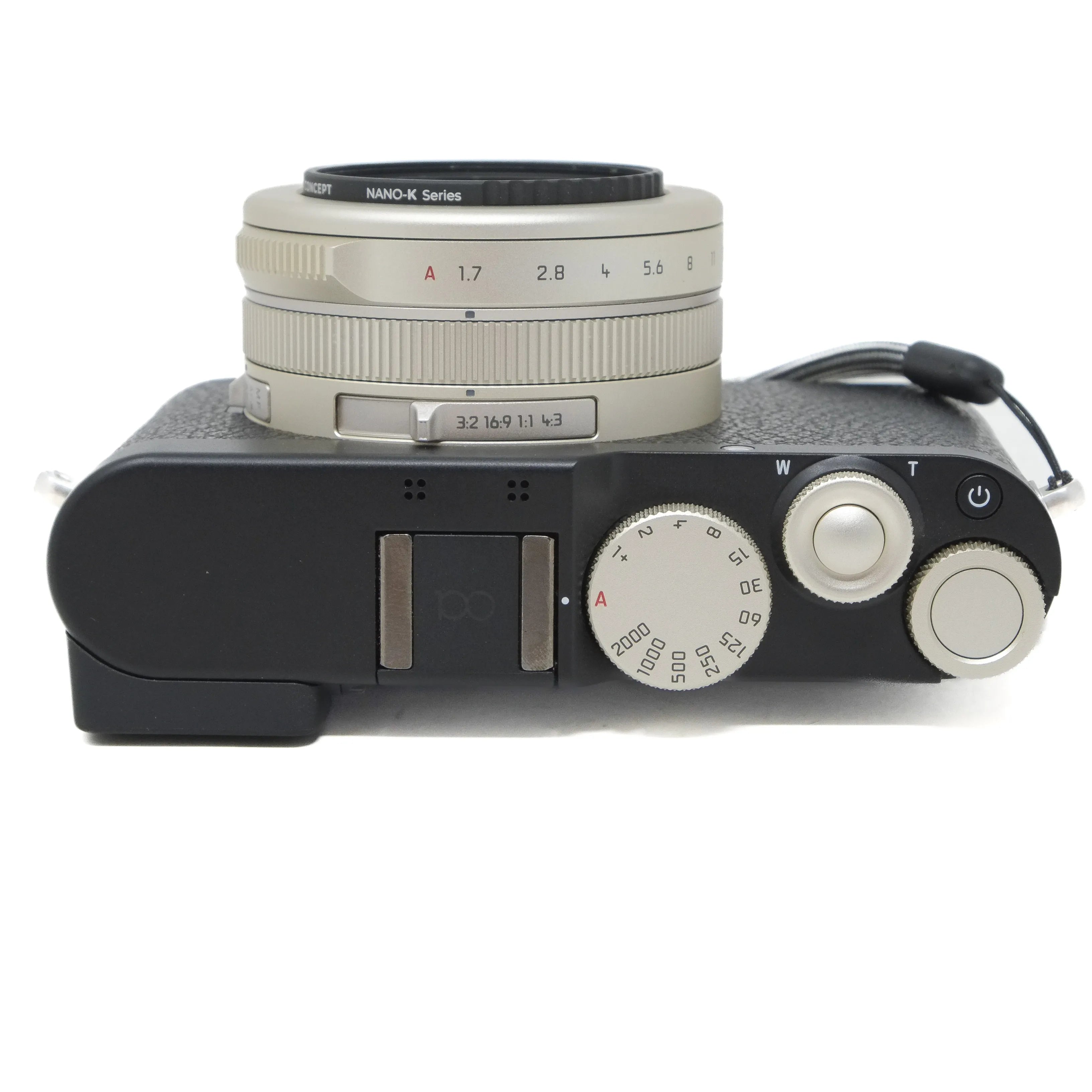 Camera with lens and control dials on a white background