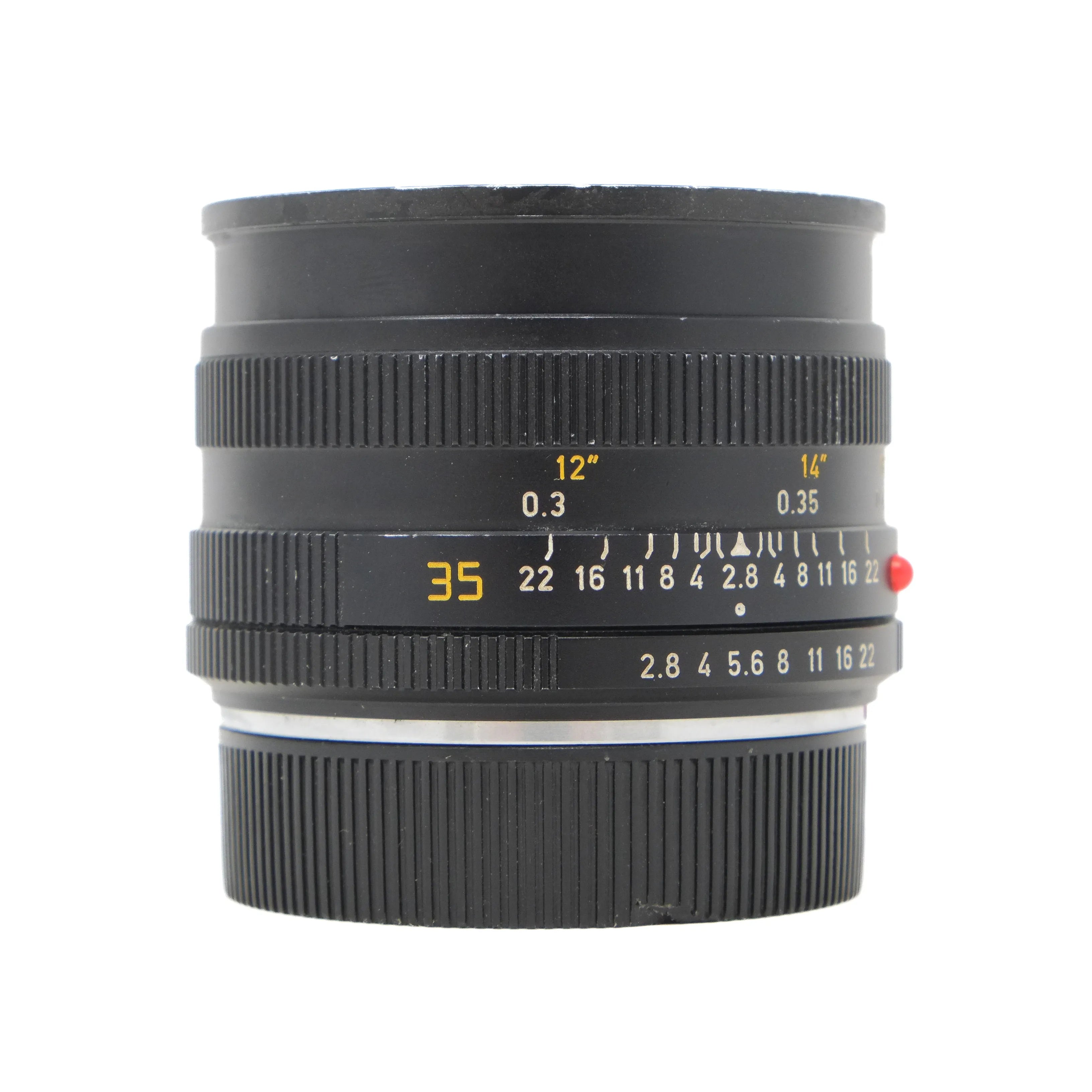 Camera lens with focus and aperture controls on a white background