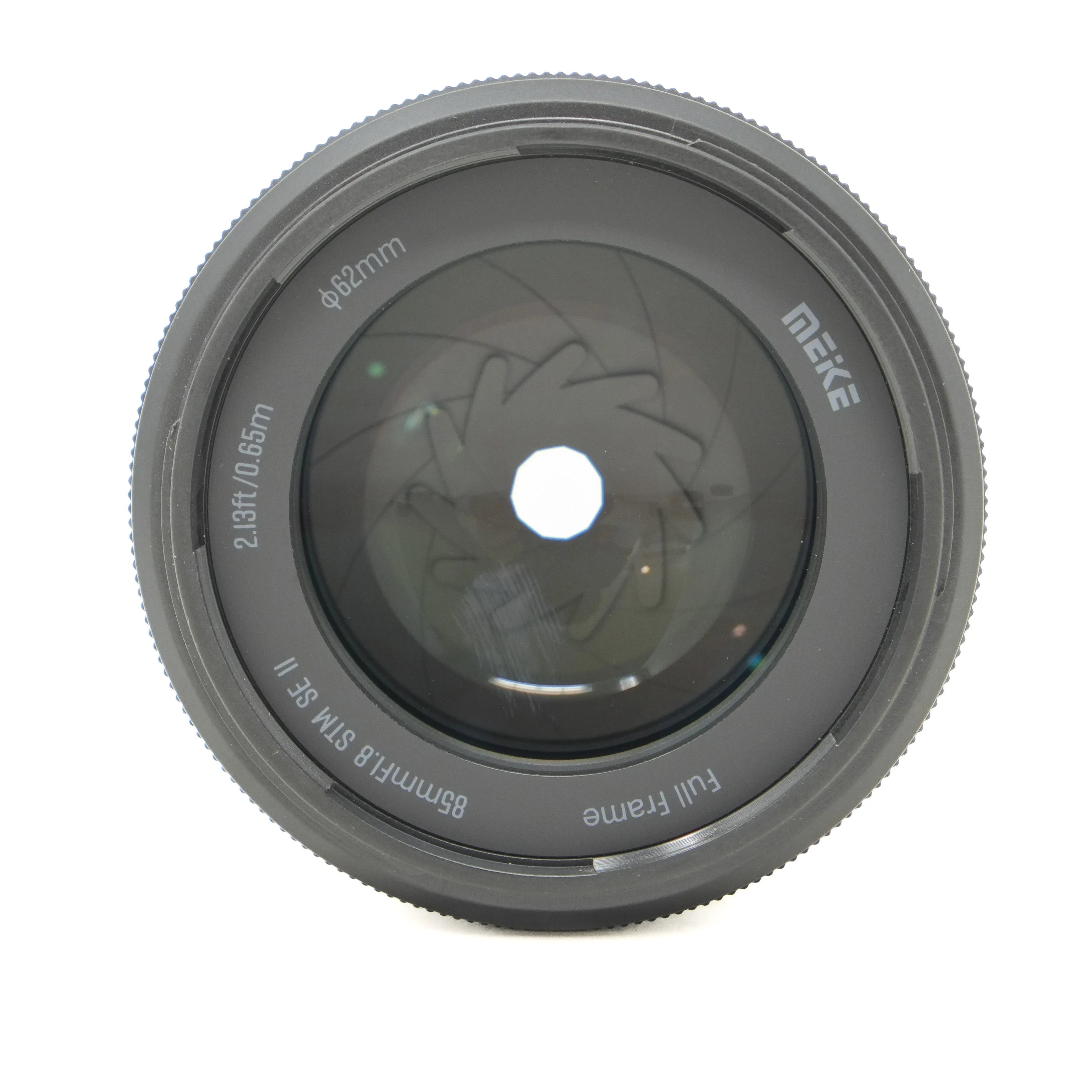 Camera lens with 'Meike' branding on a white background