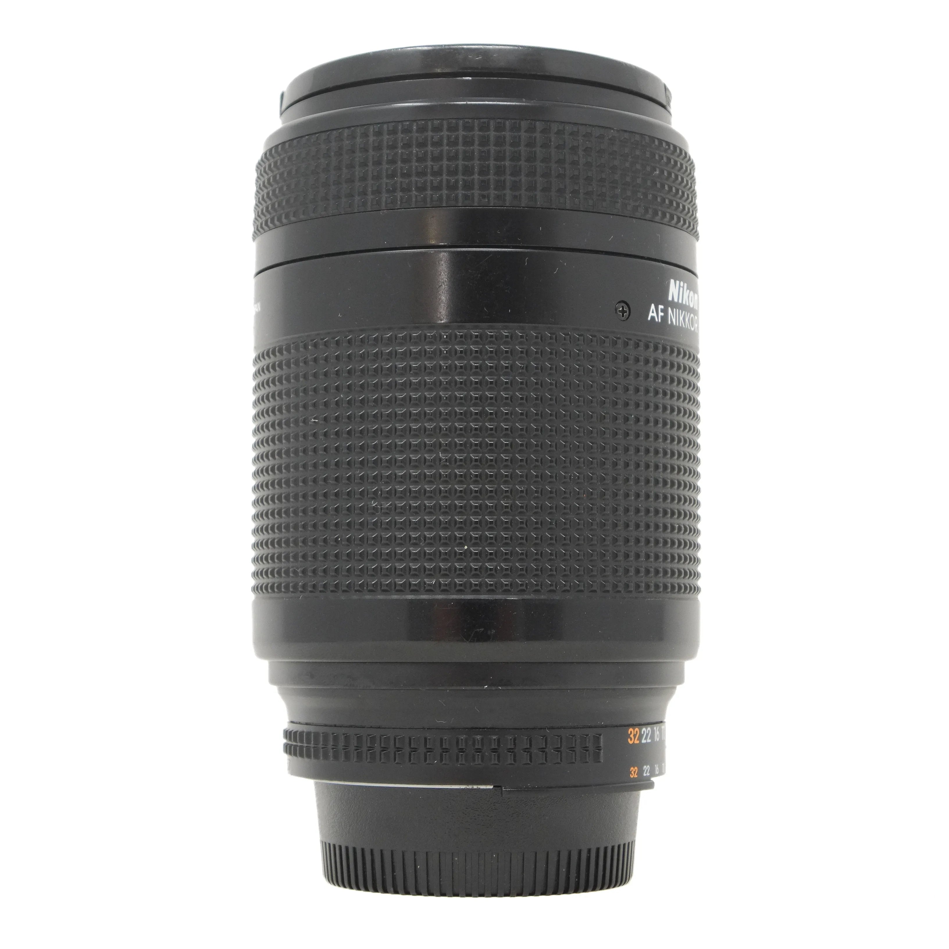 Black camera lens on a white background