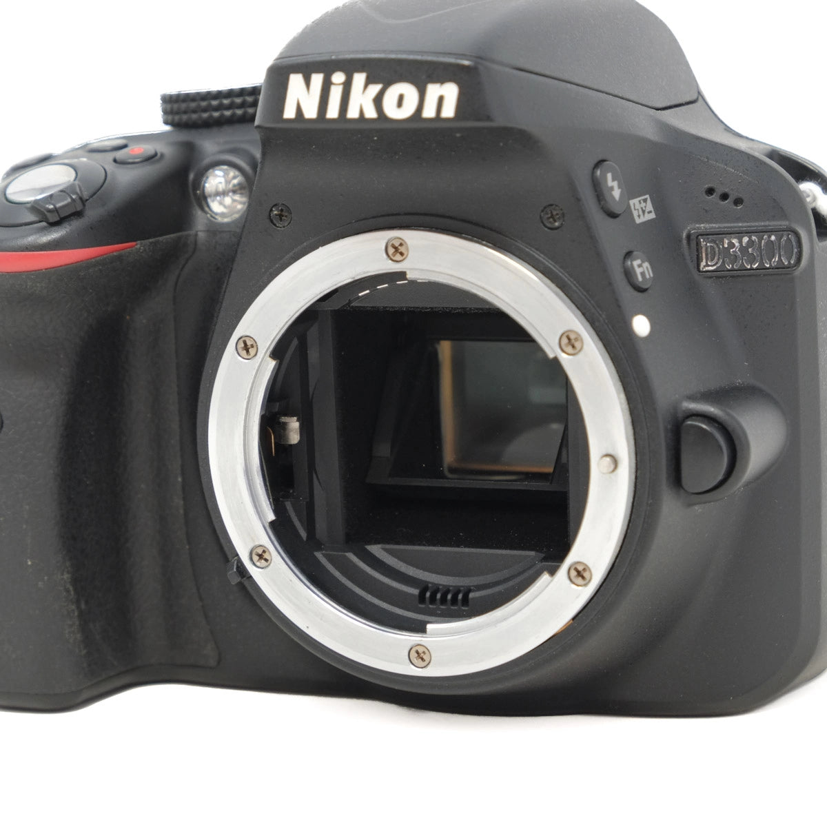 Nikon DSLR camera body on a white background