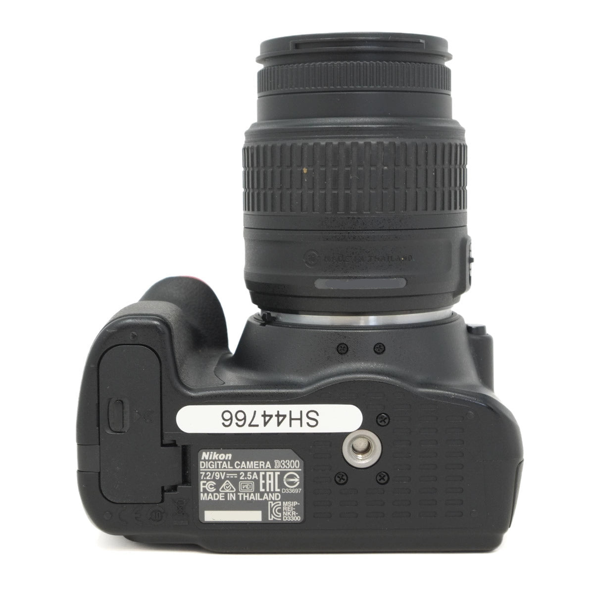 Nikon camera body with lens on a white background