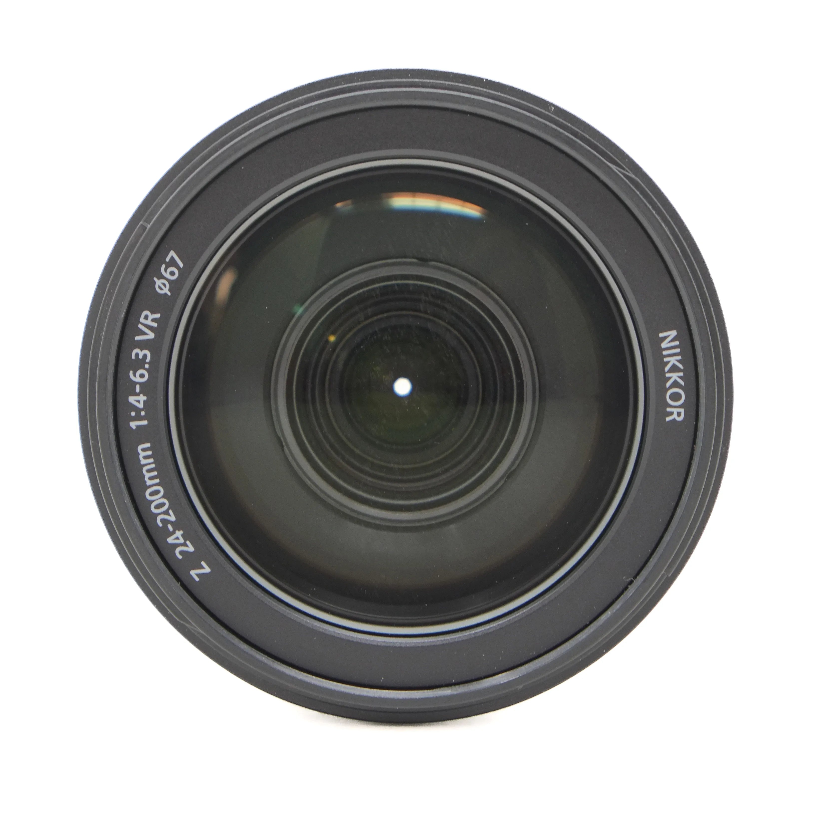Camera lens with Nikkor branding on a white background