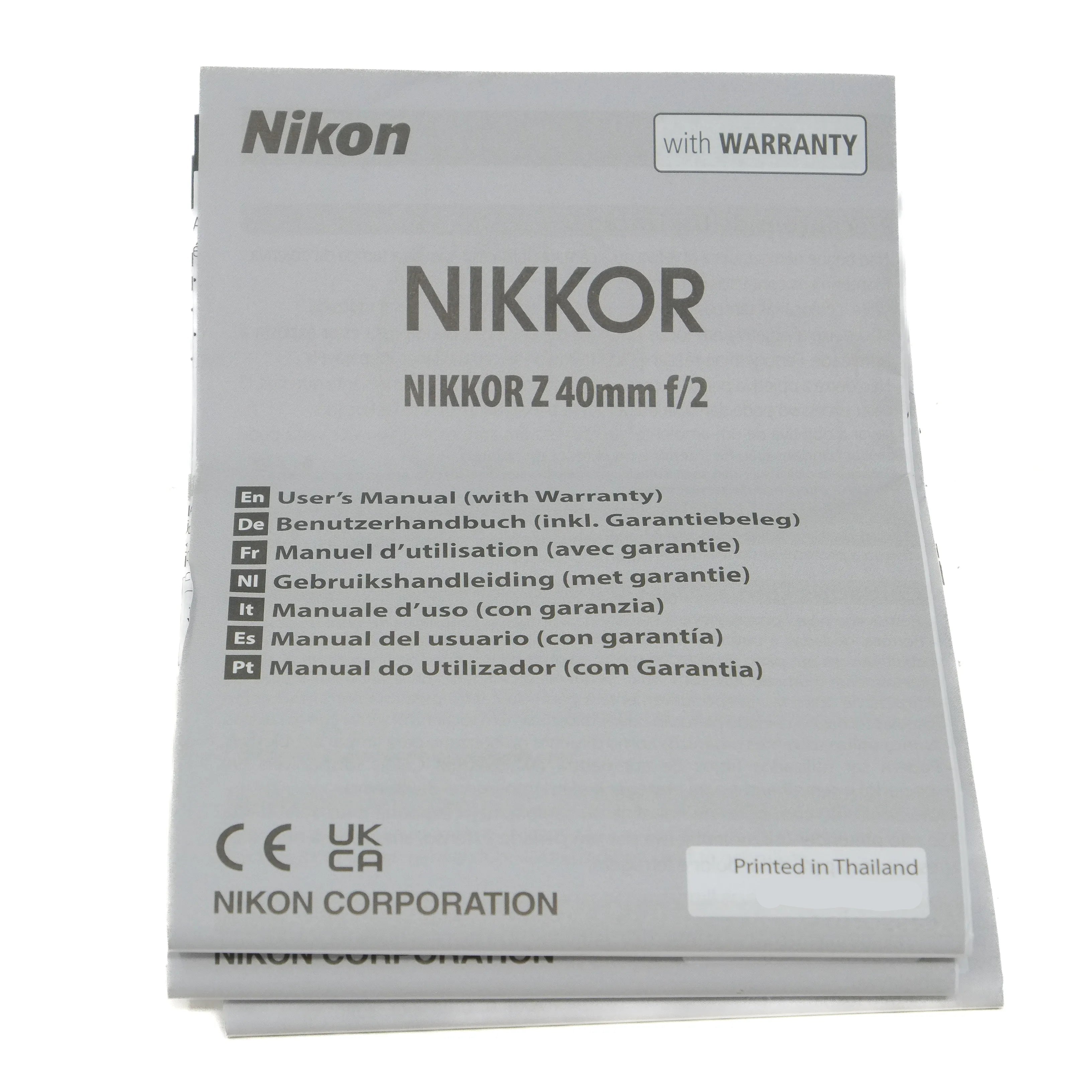 Nikon Nikkor Z 40mm f/2 camera lens user manual on a white background
