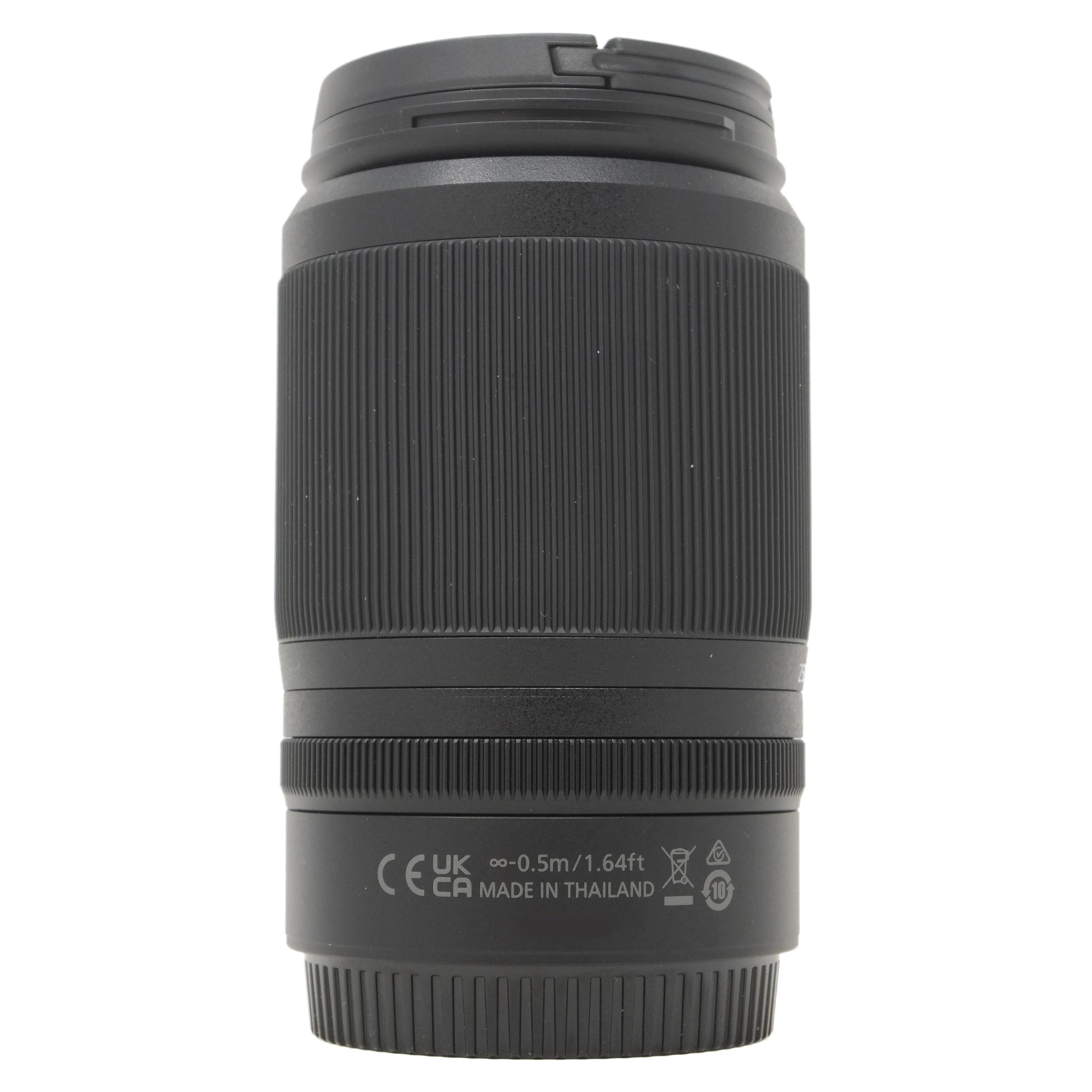 Black camera lens on a white background