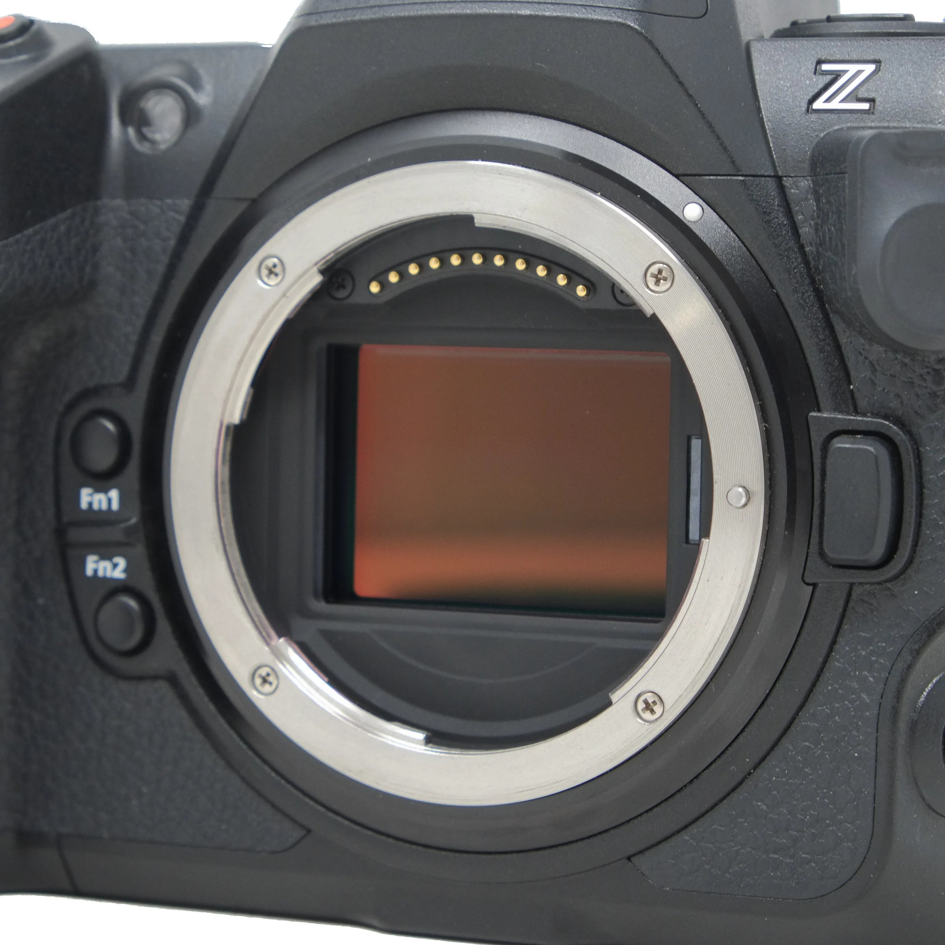 Close-up of a camera body with a view of the sensor