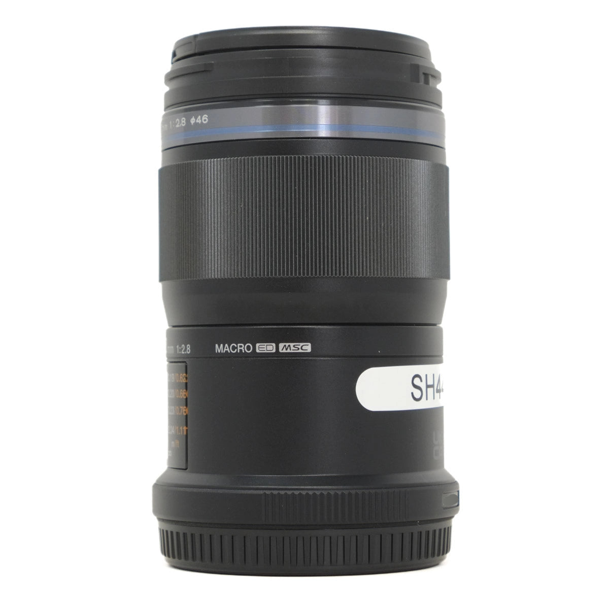 Black camera lens on a white background