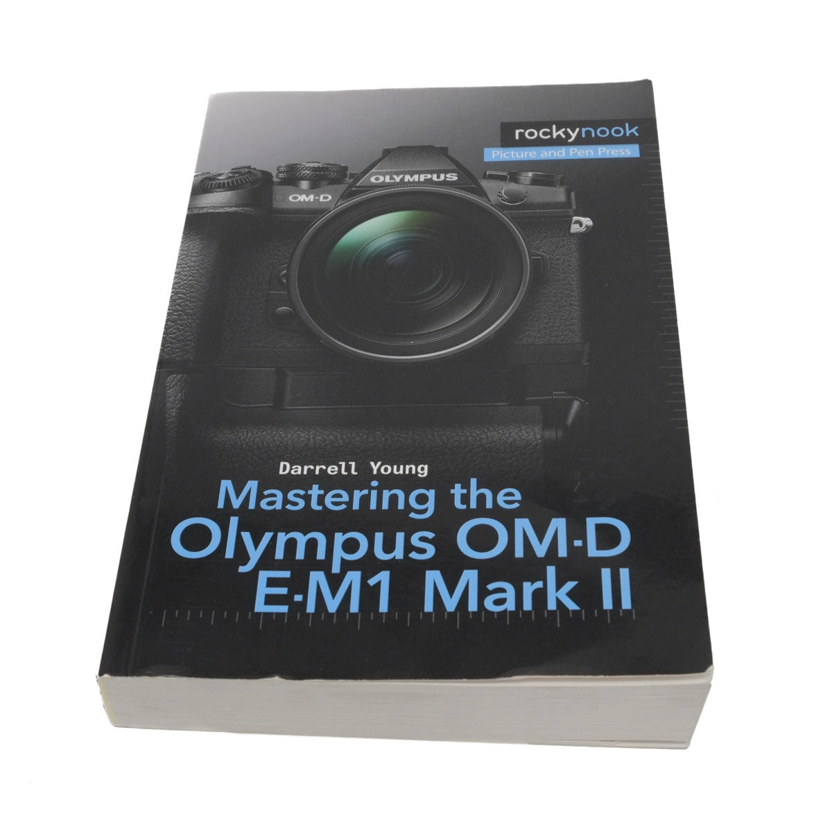 Book titled 'Mastering the Olympus OM-D E-M1 Mark II' by Darrell Young on a white background