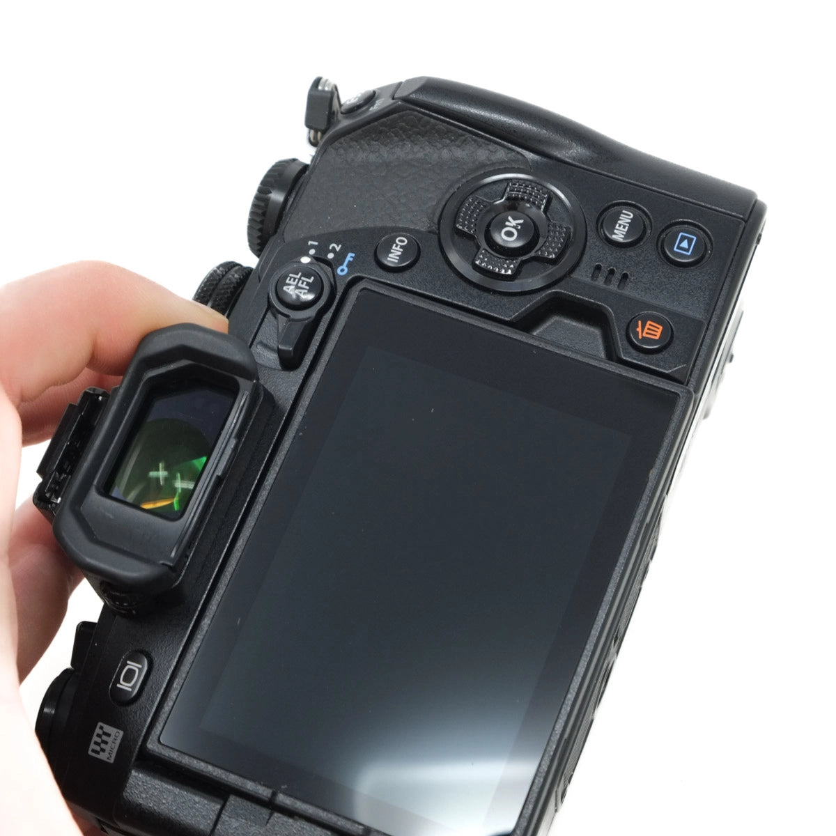 Digital camera with a screen and control buttons on a white background