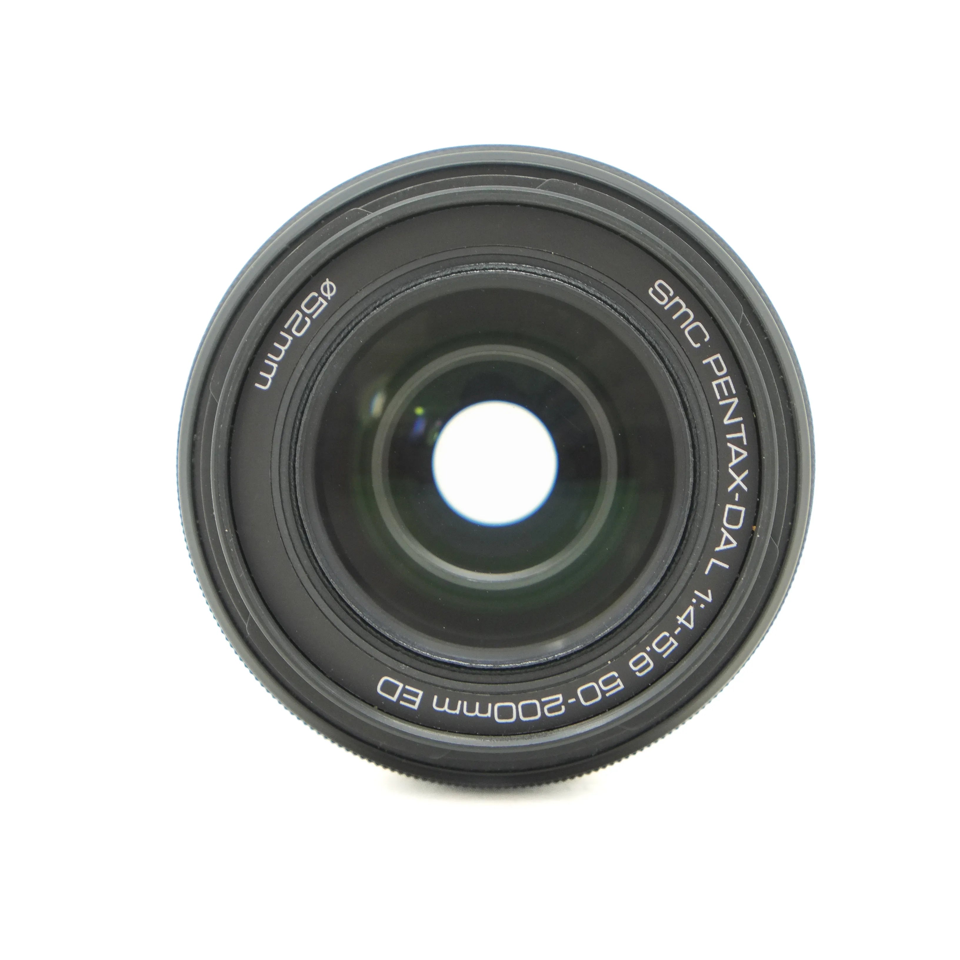Camera lens with 'SMC PENTAX-DAL' branding on a white background