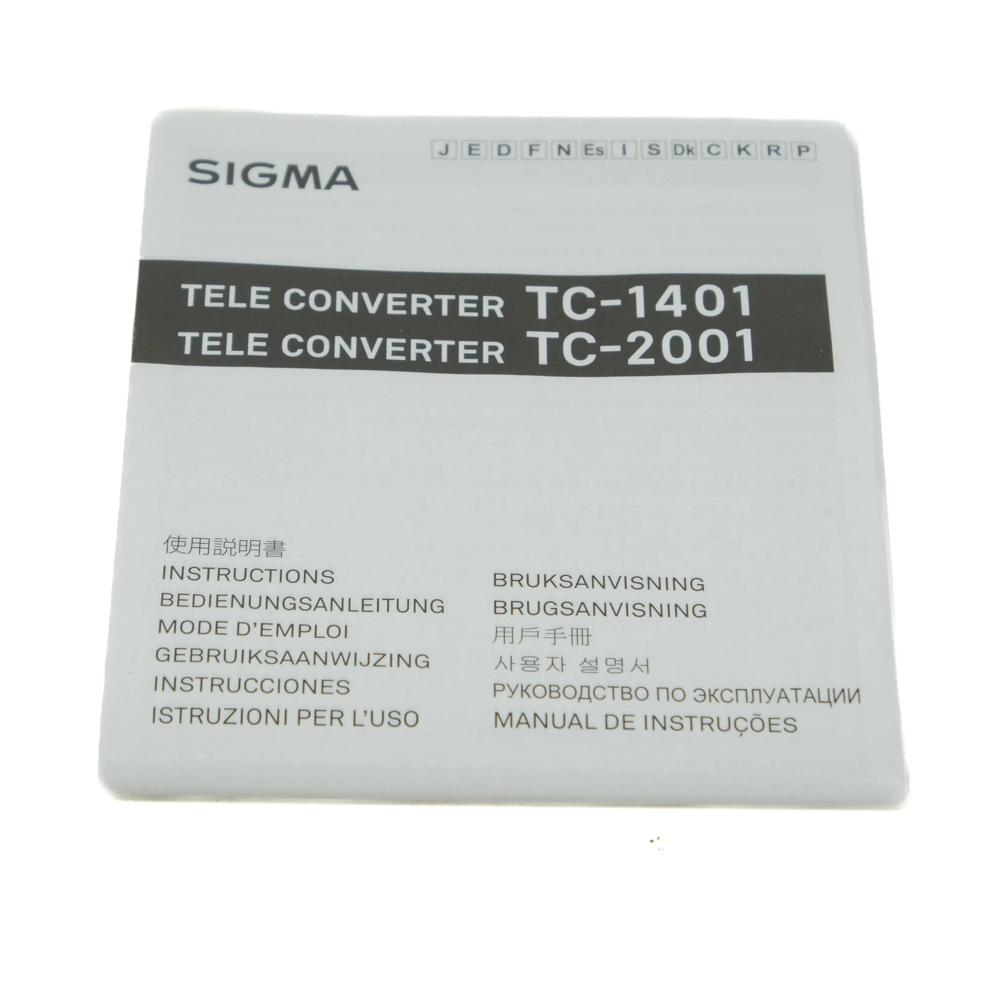 Sigma teleconverter manual with model numbers TC-1401 and TC-2001 on a white background