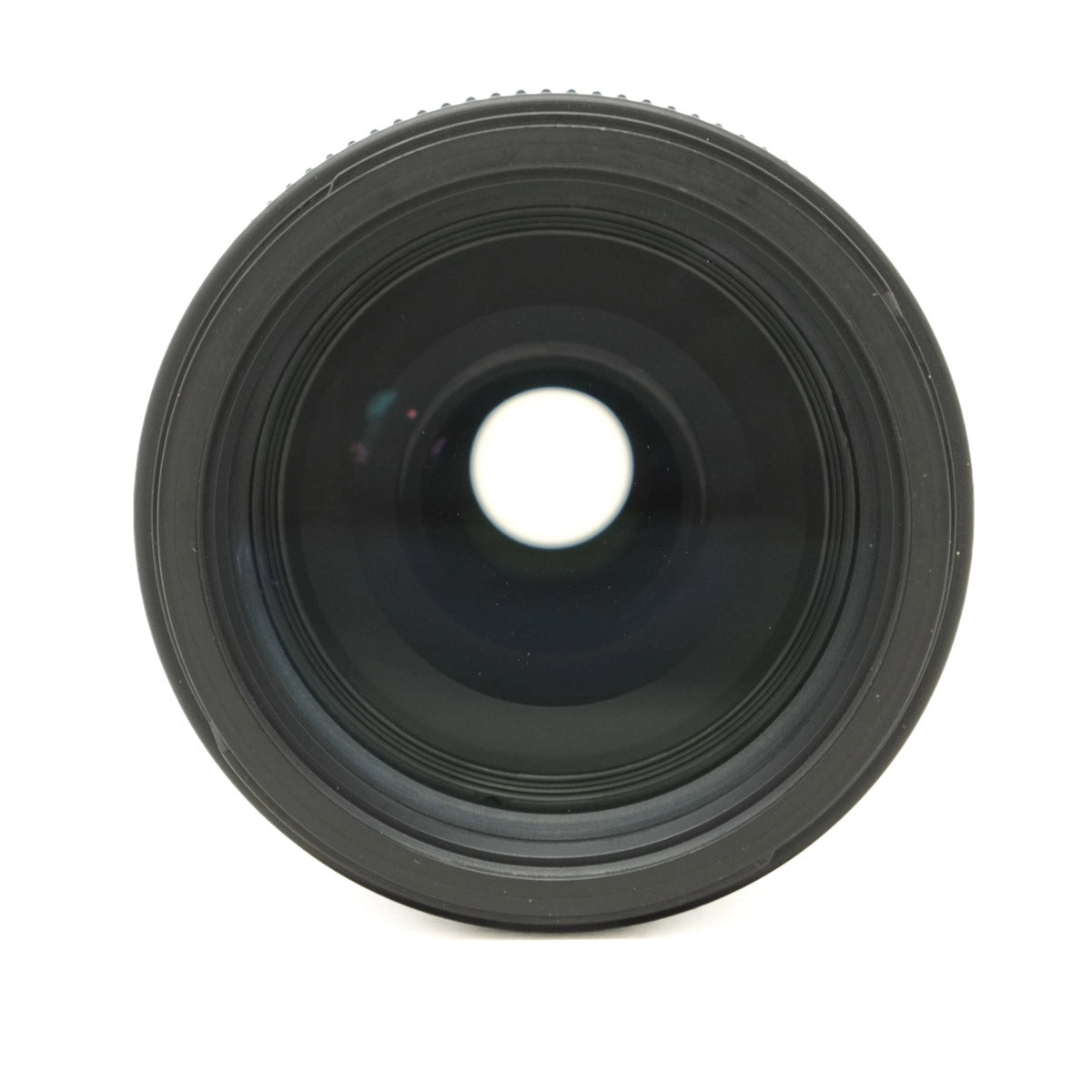 Black camera lens on a white background