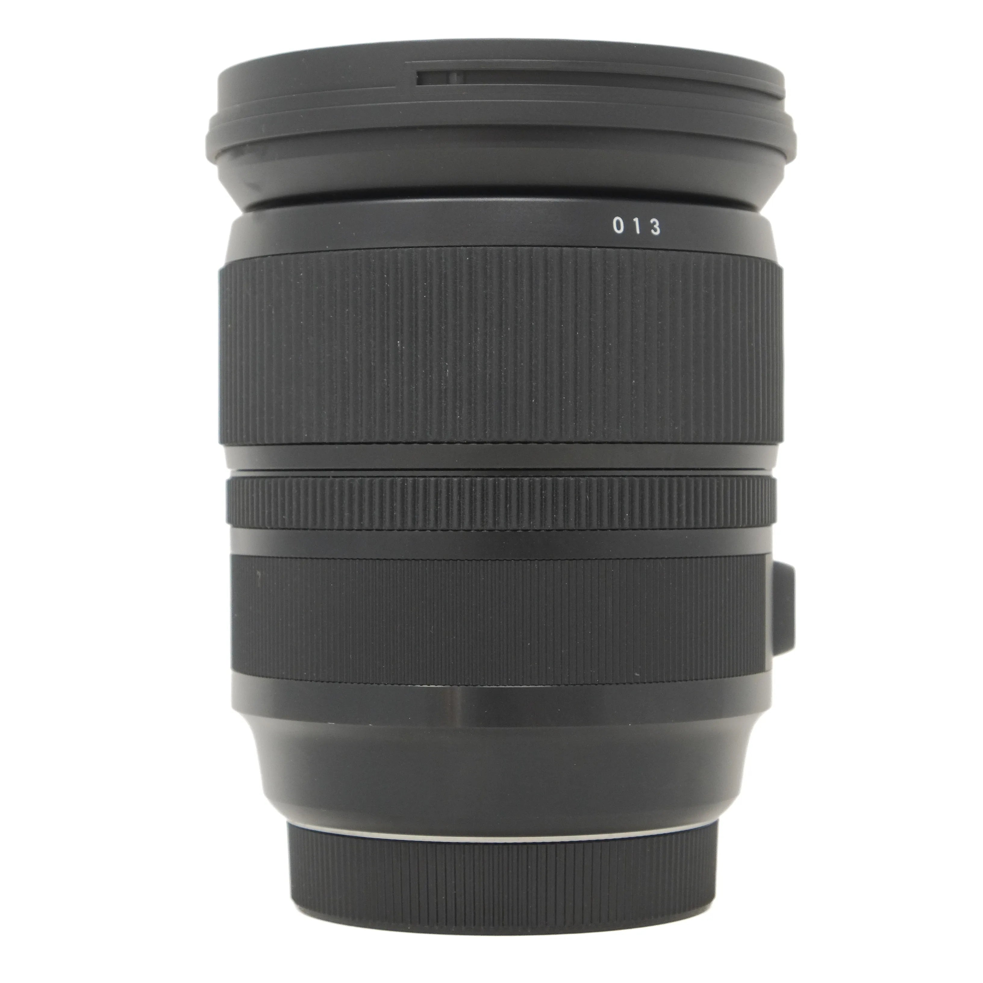 Black camera lens on a white background